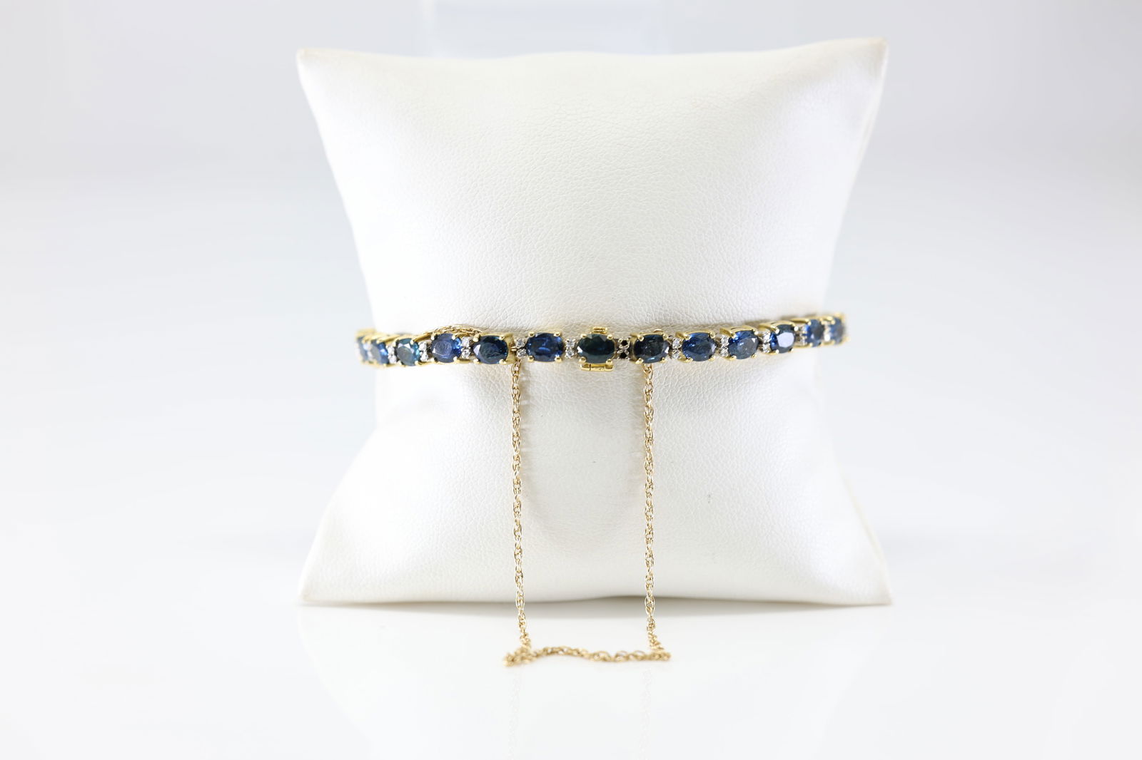 Sapphire & Diamond Bracelet 18Kt.: Ladies 18Kt Yellow Gold Sapphire & Diamond Bracelet. This Beautiful Bracelet has 26 Sapphire Gemstones / 50 Round Sparkling Diamonds. Diamond Weinth Approx: 1.00ctw. Bracelet Length: 14.00. Total
