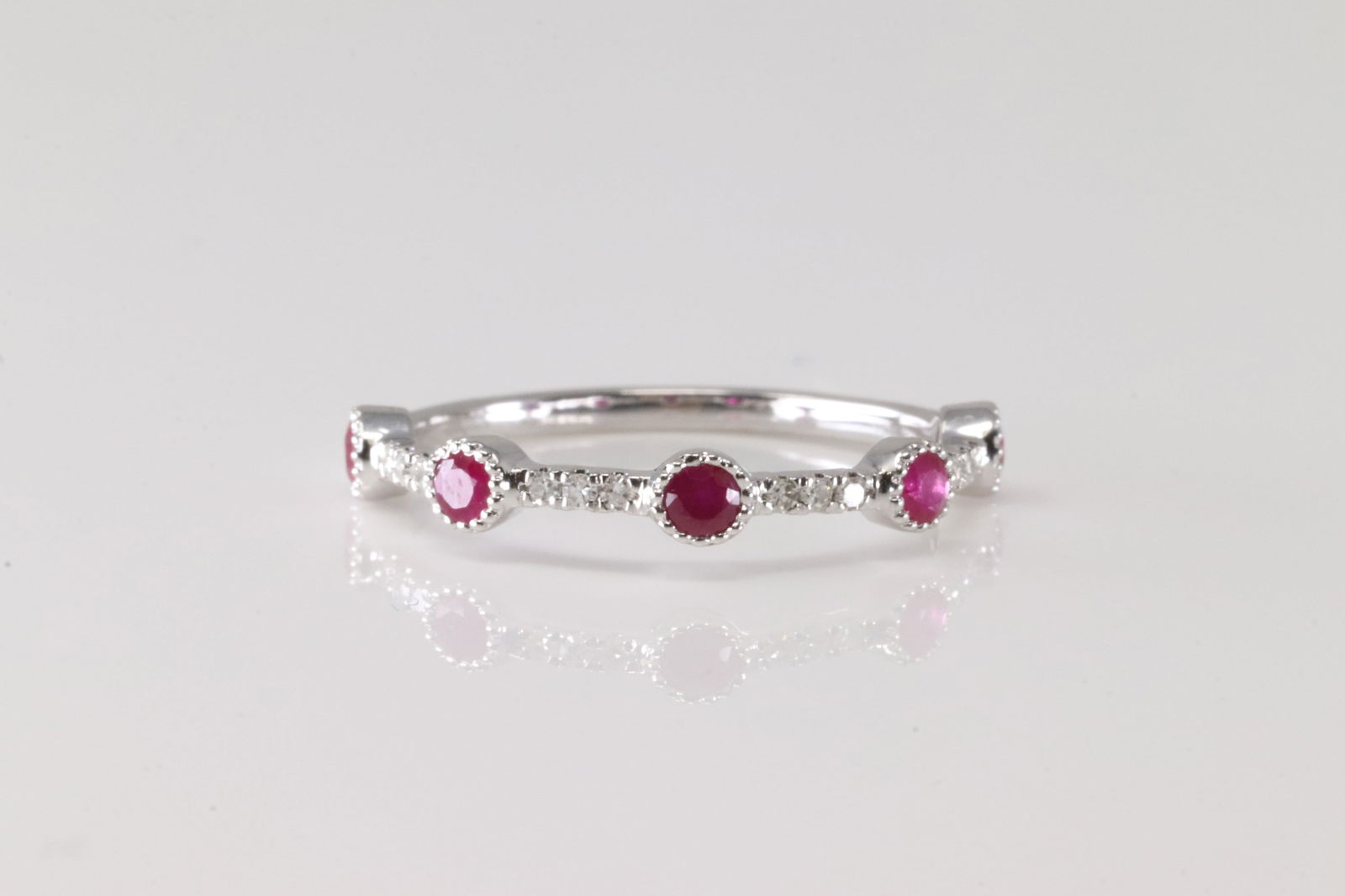 Ruby & Diamond Ring 10Kt.: Ladies 10Kt White Gold Ruby & Diamond Ring. This Ring has Pink Rubies with Sparkling Diamonds. Diamonds weight: 0.10ctw. Ring size: 7.00.