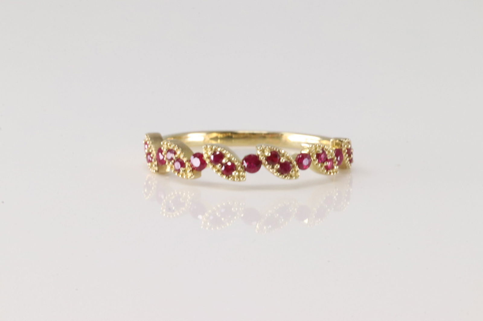 Ruby Ring 10Kt.: Ladies 10Kt Yellow Gold Ruby Ring. This Ring has Pink round Rubies. Ring size: 7.00.
