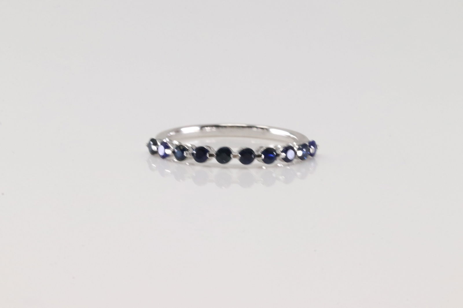 Sapphire Ring 10Kt.: Ladies 10Kt White Gold Sapphire Ring. This ring has 10 round Blue Sapphires. Sapphires weight: Ring size: 7.00.