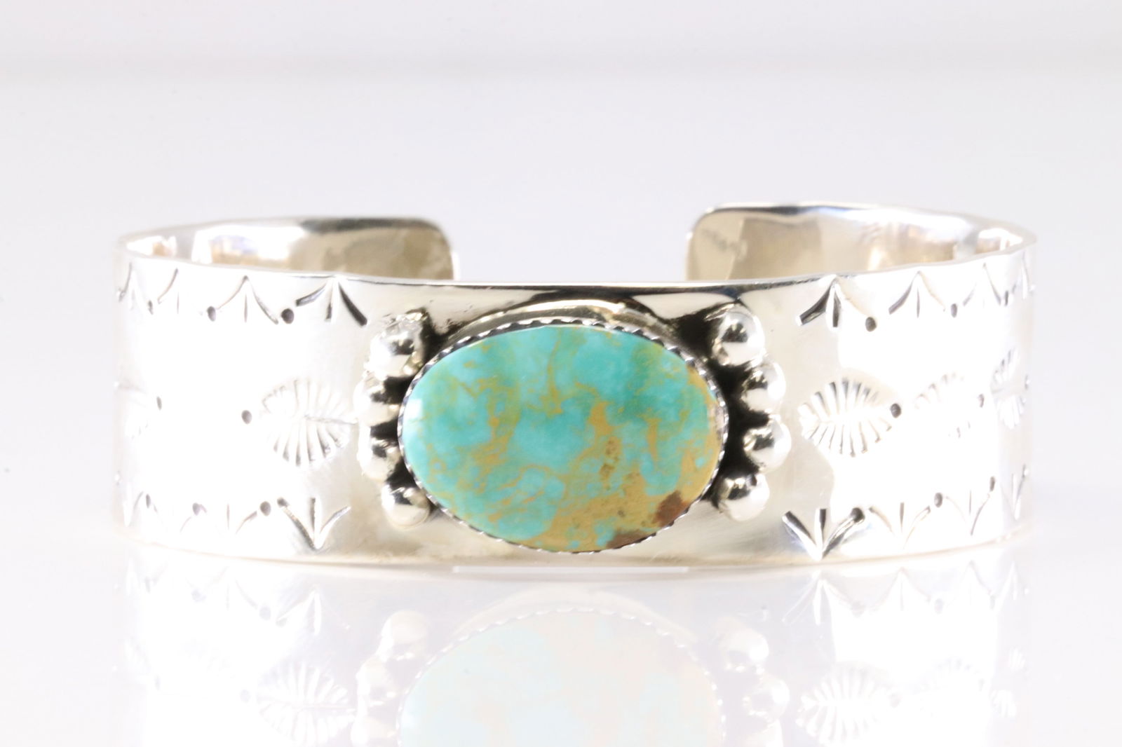 Native America Navajo Sterling Silver Turquoise Bracelet Cuff By Daniel Dakai.: This is a Native America Navajo Sterling Silver Turquoise Bracelet Cuff By Daniel Dakai.