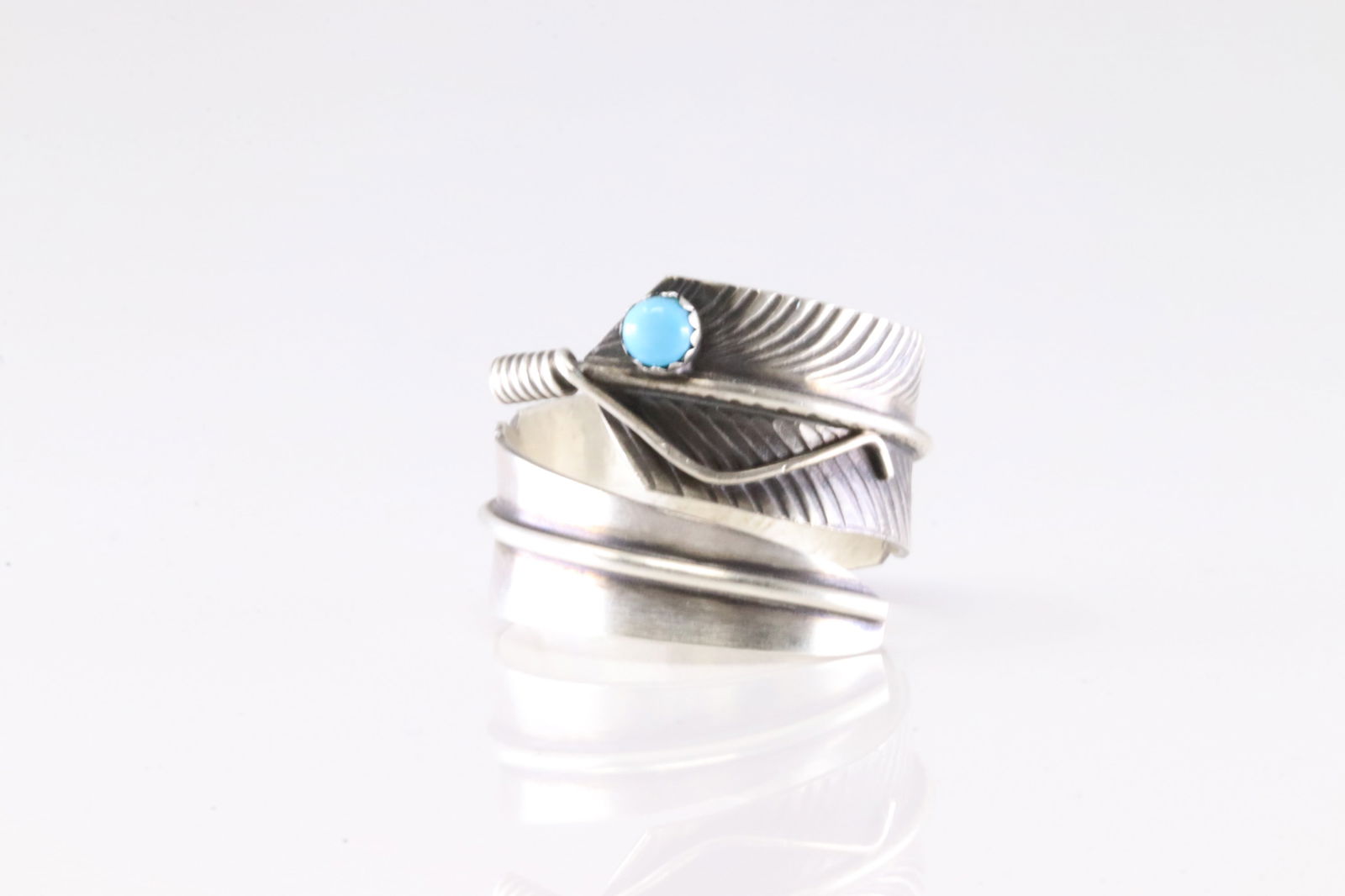 Native America Sterling Silver Turquoise Feather Ring By C.C.: This is a Native America Sterling Silver Turquoise Feather Ring By C.C. Ring size: 7.75.