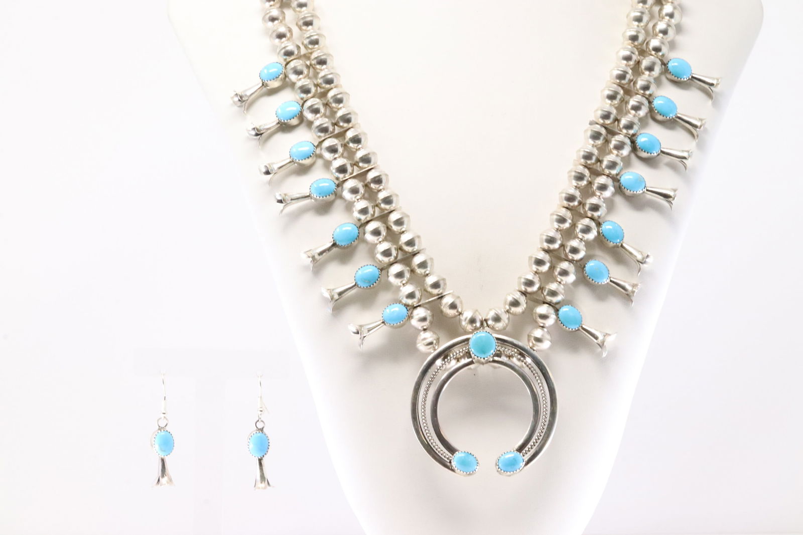 Native America Navajo Sterling Silver Turquoise Squash Blossom Necklace & Earring's Set.: This is a Native America Navajo Sterling Silver Turquoise Squash Blossom Necklace & Earring's Set. Necklace length: 28.00" Total weight: 105.60 Grams.