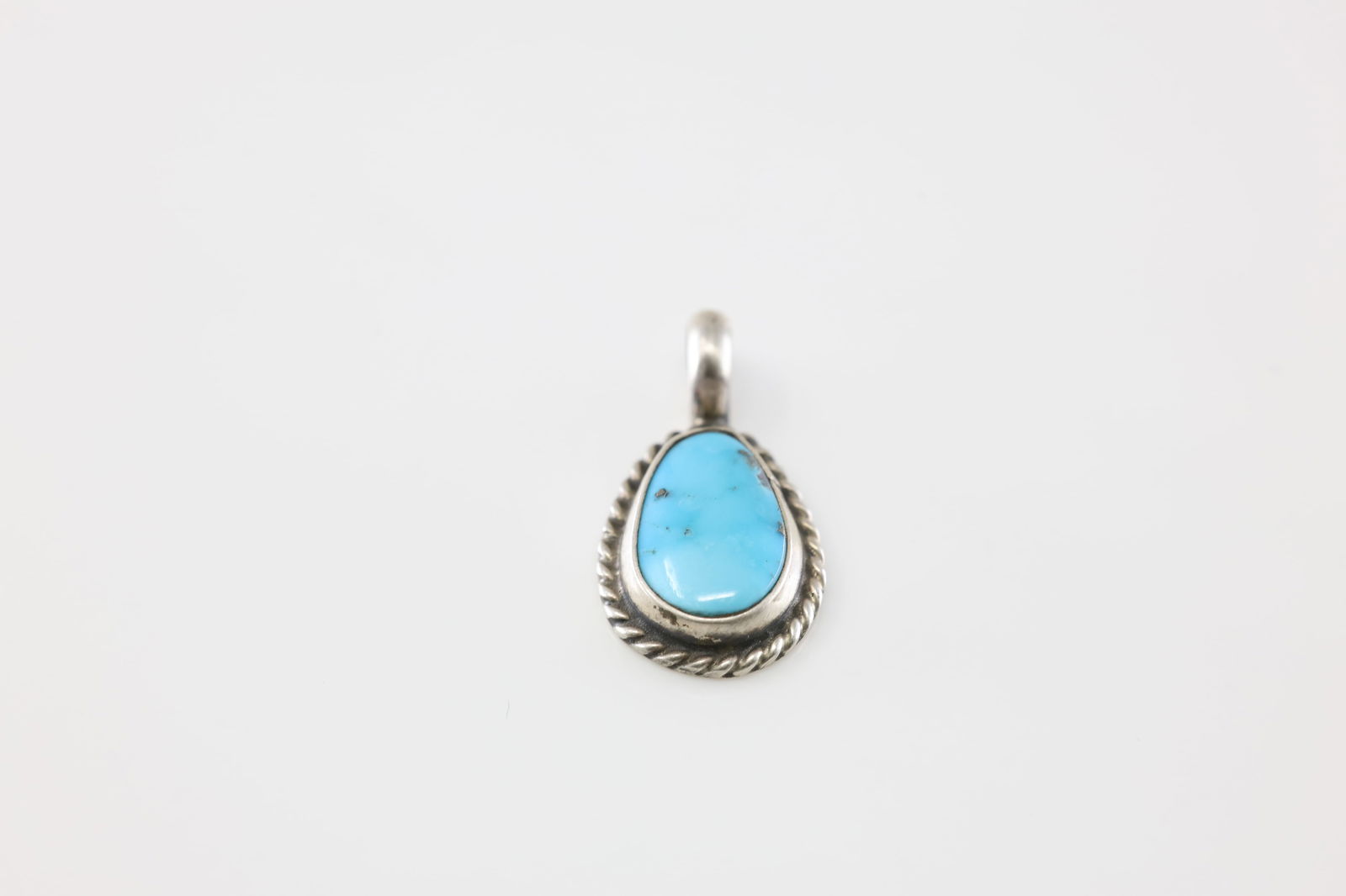 Native America Navajo Sterling Silver Turquoise Pendant By G.James.: This is a Native America Navajo Sterling Silver Turquoise Pendant By G.James.