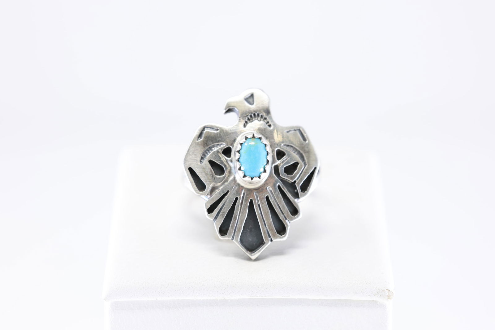Native America Navajo Sterling Silver Turquoise Thunderbird Ring By Genevieve Francisco. From: This is a Native America Navajo Sterling Silver Turquoise Thunderbird Ring By Genevieve Francisco. From R.B Company. Ring size: 6.25.
