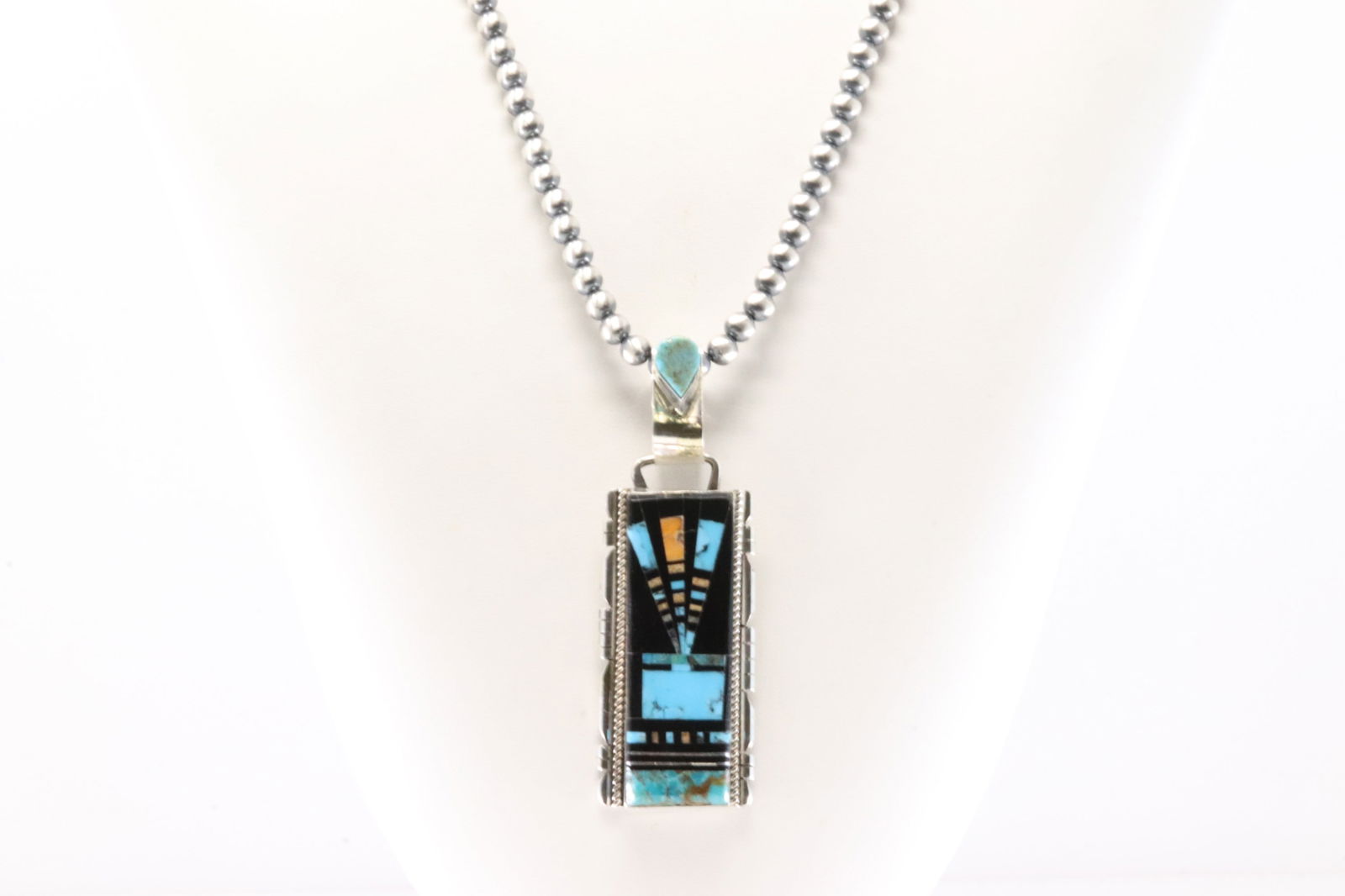 Native America Navajo Sterling Silver Night Sky Multi-Color Pendant By Ray Jack. With Machine Made: This is a Native America Navajo Sterling Silver Night Sky Multi-Color Pendant By Ray Jack. With Machine Made Peral Beaded Sterling Silver Necklace. Necklace length: 22.00"