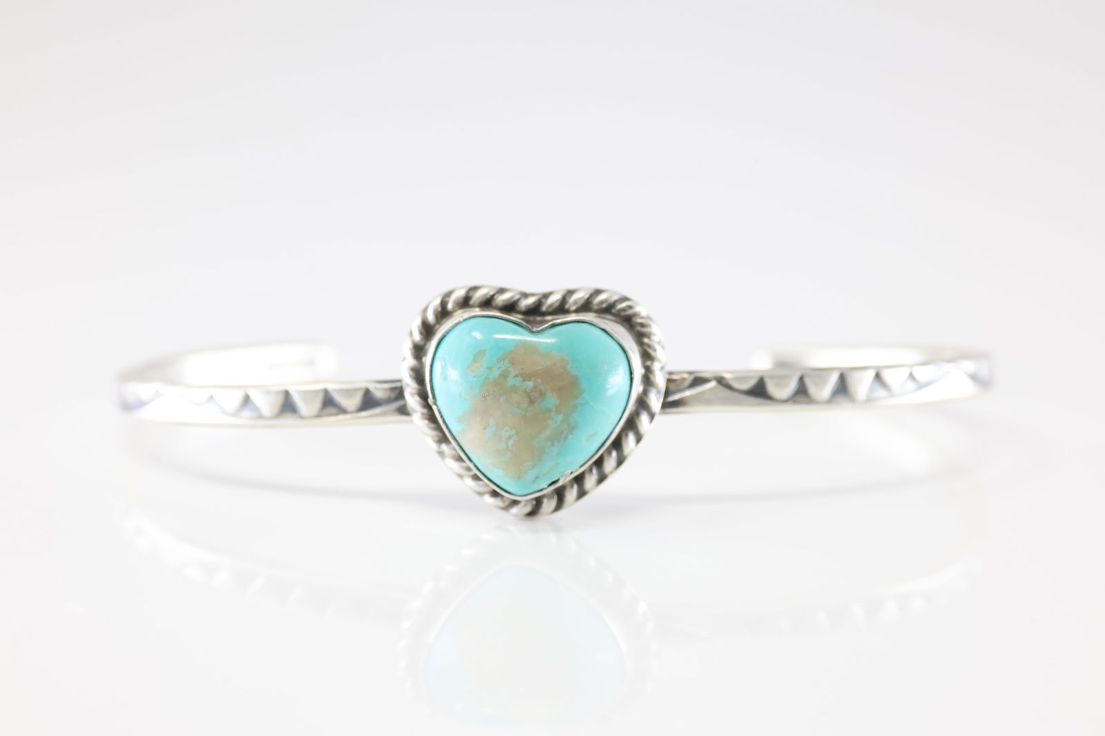 Native America Navajo Sterling Silver Kingman Turquoise Heart Bracelet Cuff By Donovan Skeets.: This is a Native America Navajo Sterling Silver Kingman Turquoise Heart Bracelet Cuff By Donovan Skeets.