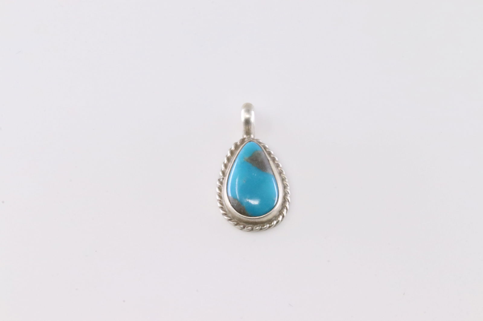 Native America Navajo Sterling Silver Turquoise Pendant By Geraldine James.: This is a Native America Navajo Sterling Silver Turquoise Pendant By Geraldine James.