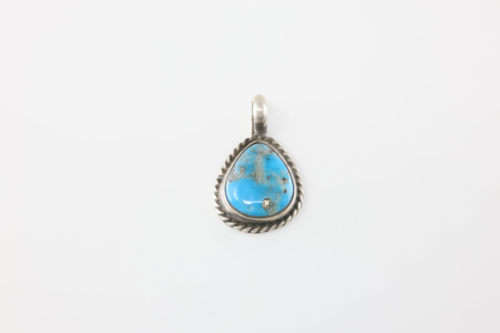 Native American Navajo Sterling Silver Turquoise Pendant By Geraldine James.: This is a Native American Navajo Sterling Silver Turquoise Pendant By Geraldine James.