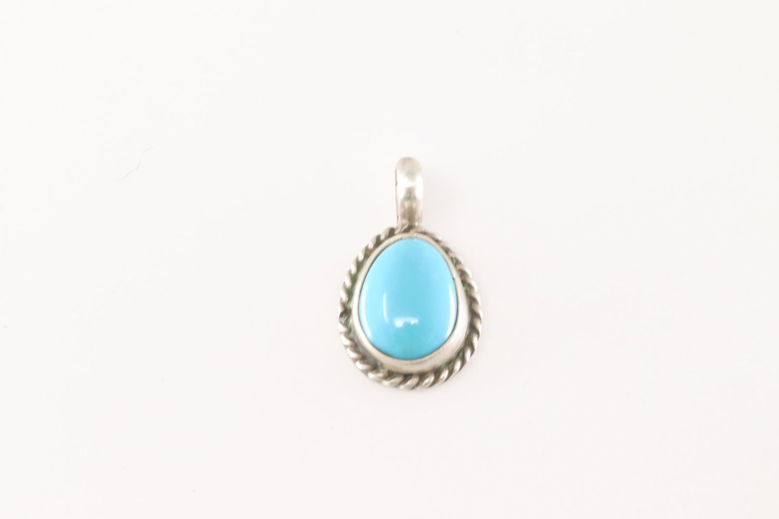 Native American Navajo Sterling Silver Turquoise Pendant By Geraldine James.: This is a Native American Navajo Sterling Silver Turquoise Pendant By Geraldine James.