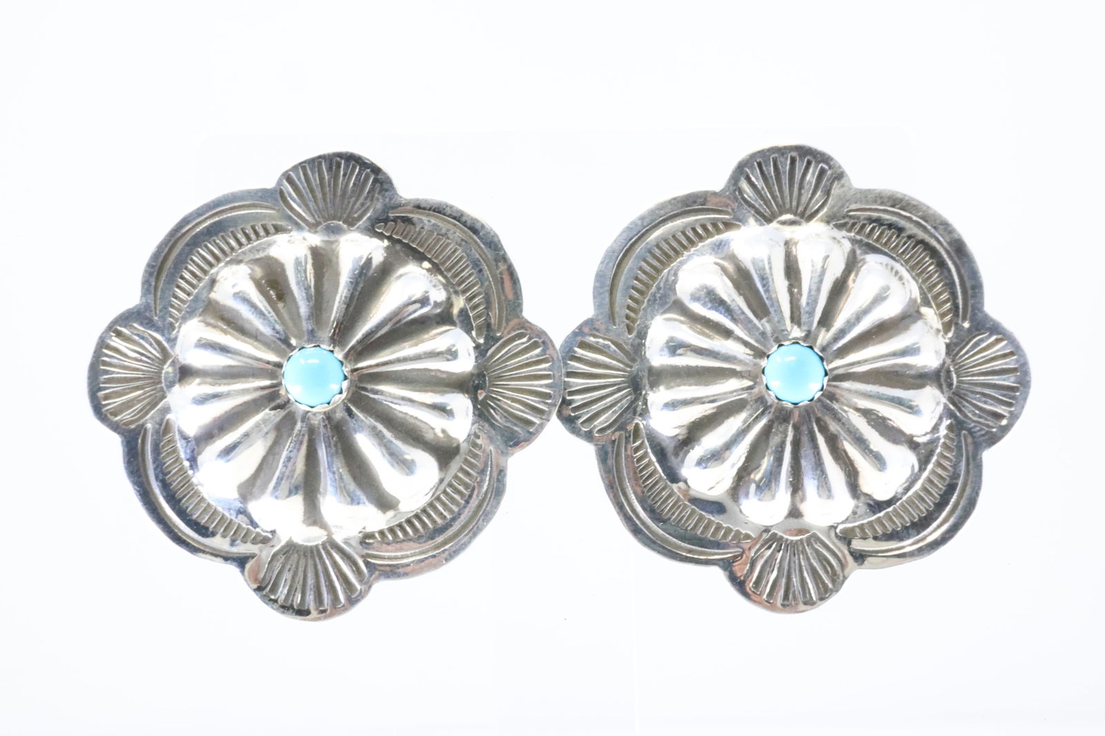 America Sterling Silver Conch Turquoise Post Earring's.: This is a America Sterling Silver Conch Turquoise Post Earring's.