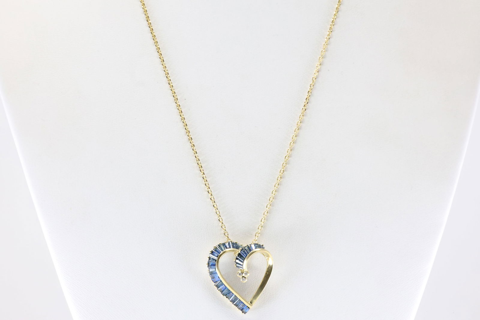 Shappire & Diamond Heart Pendant / Necklace 14Kt.: Ladies 14Kt Yellow Gold Sapphire & Diamond Heart Pendant / Necklace. This Chraming Heart Pendant has Blue Sapphires with Sparkling Diamonds and 14k Necklace. Necklace length: 20.00" Total weight: