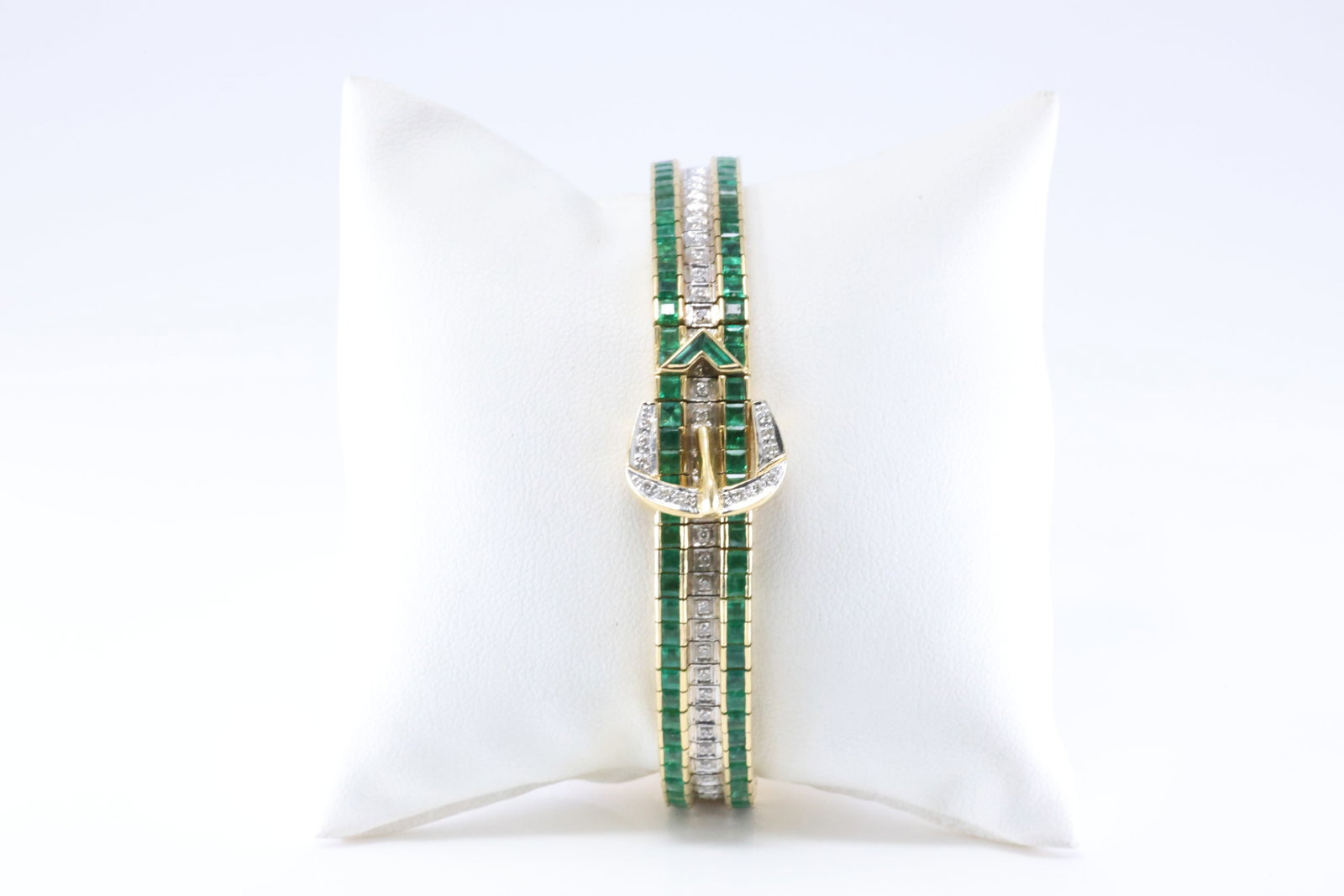 Elegant Emerald & Diamond Belt Bracelet 18Kt.: Elegant 18Kt Yellow Gold Emerald & Diamond Belt Bracelet. This Elegant Belt Design Bracelet has 80 Sprakling Diamonds with Green Emeralds Gemston. Diamonds weight approx: 0.90 ctw Bracelet length: