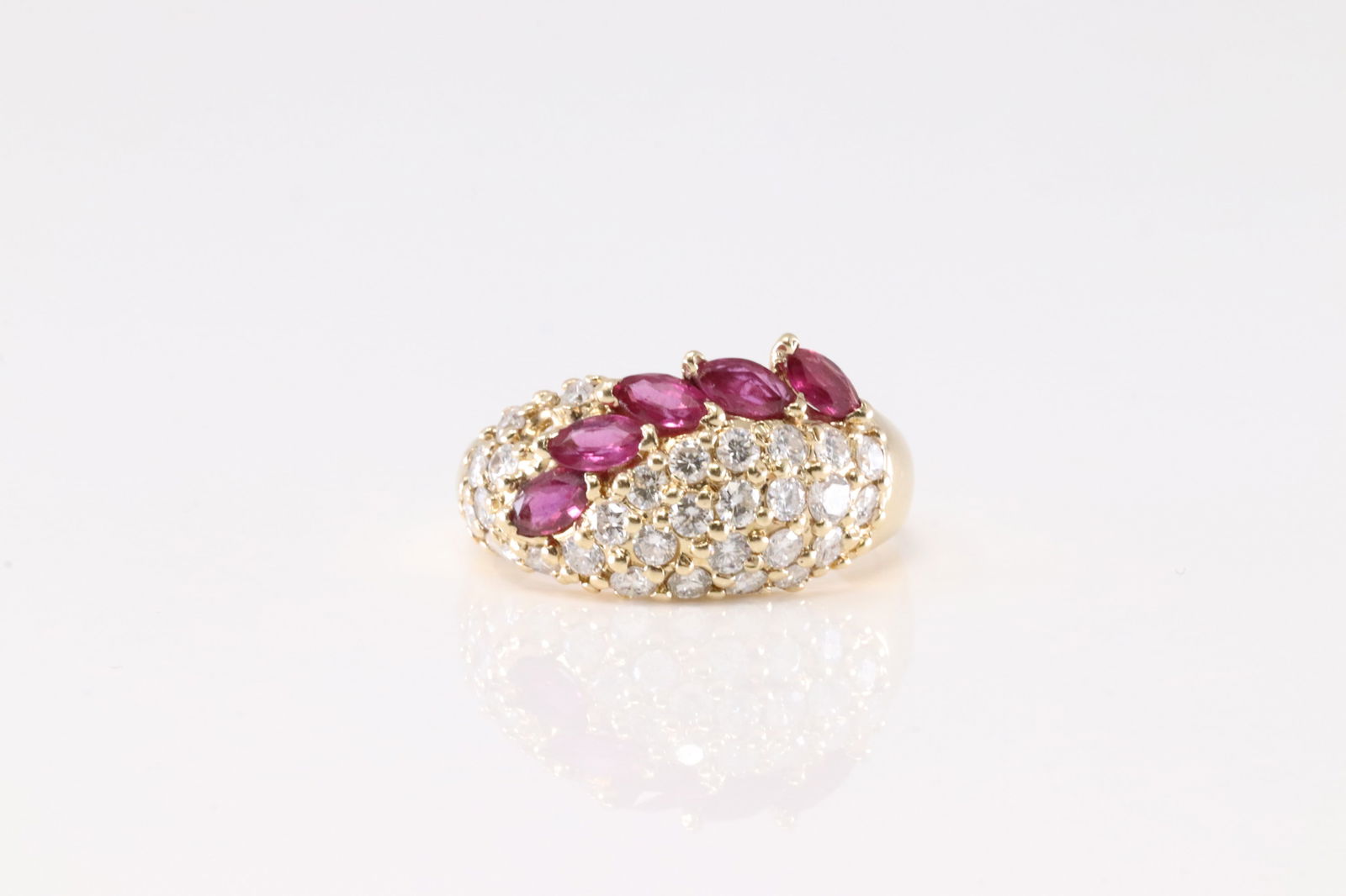Rubye & Diamond Ring 14Kt.: Ladies 14Kt Yellow Gold Ruby & Diamond Ring. This Elegant Ring has 5 Maquise Rubies with 29 Brilliants Diamonds. ( Missing One ) Diamonds weight approx: 1.75ctw. Ring size: 8.50. Total weight: 5.40