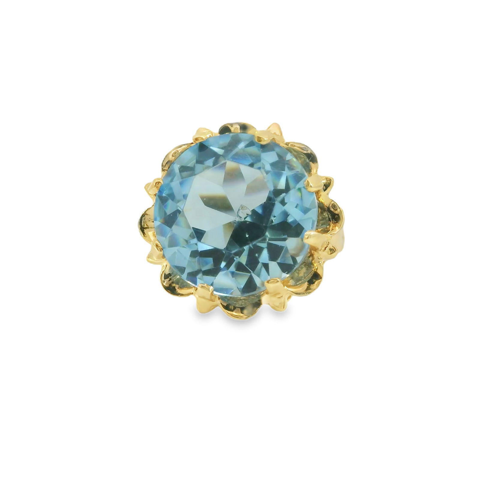 Blue Topaz Ring 14Kt.: 14Kt Yellow Gold Blue Topaz Ring. This exquisite ring features a stunning blue topaz gems set in an intricate gold band. The vibrant hue of the gem is beautifully complemented by the delicate