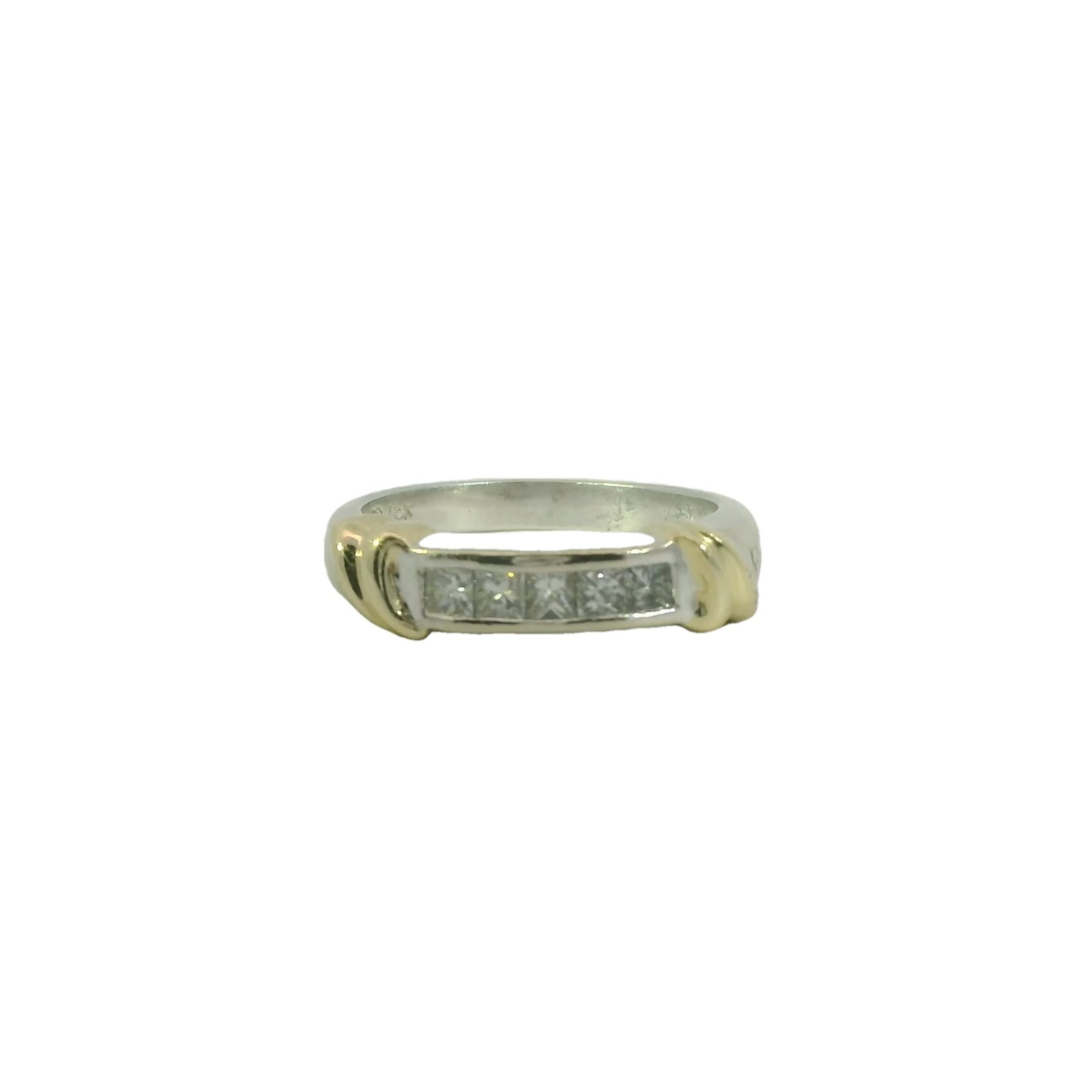 Diamond Ring 14Kt.: 14Kt White Gold Diamond Ring. This exquisite diamond ring features a sleek band adorned with a row of sparkling princess-cut diamonds. Perfect for engagements or special occasions, its timeless