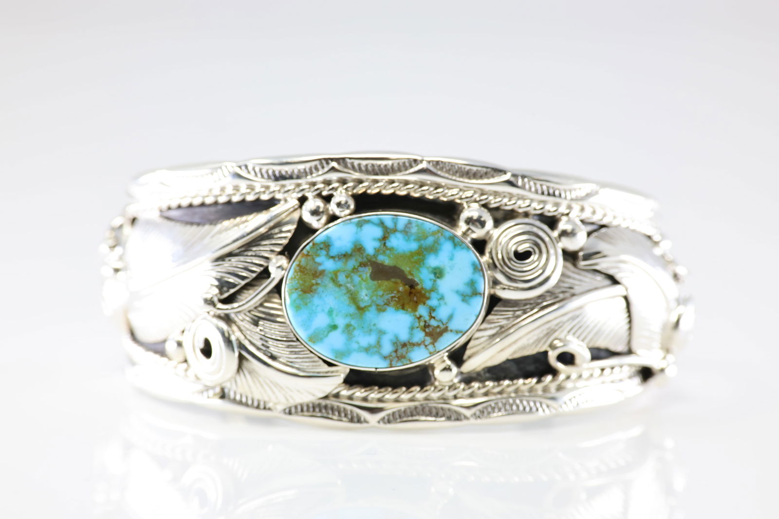 Native America Navajo Sterling Silver Turquoise Bracelet Cuff By Darrell Morgan.: This is a Native America Navajo Sterling Silver Turquoise Bracelet Cuff By Darrell Morgan. Stamp DM.
