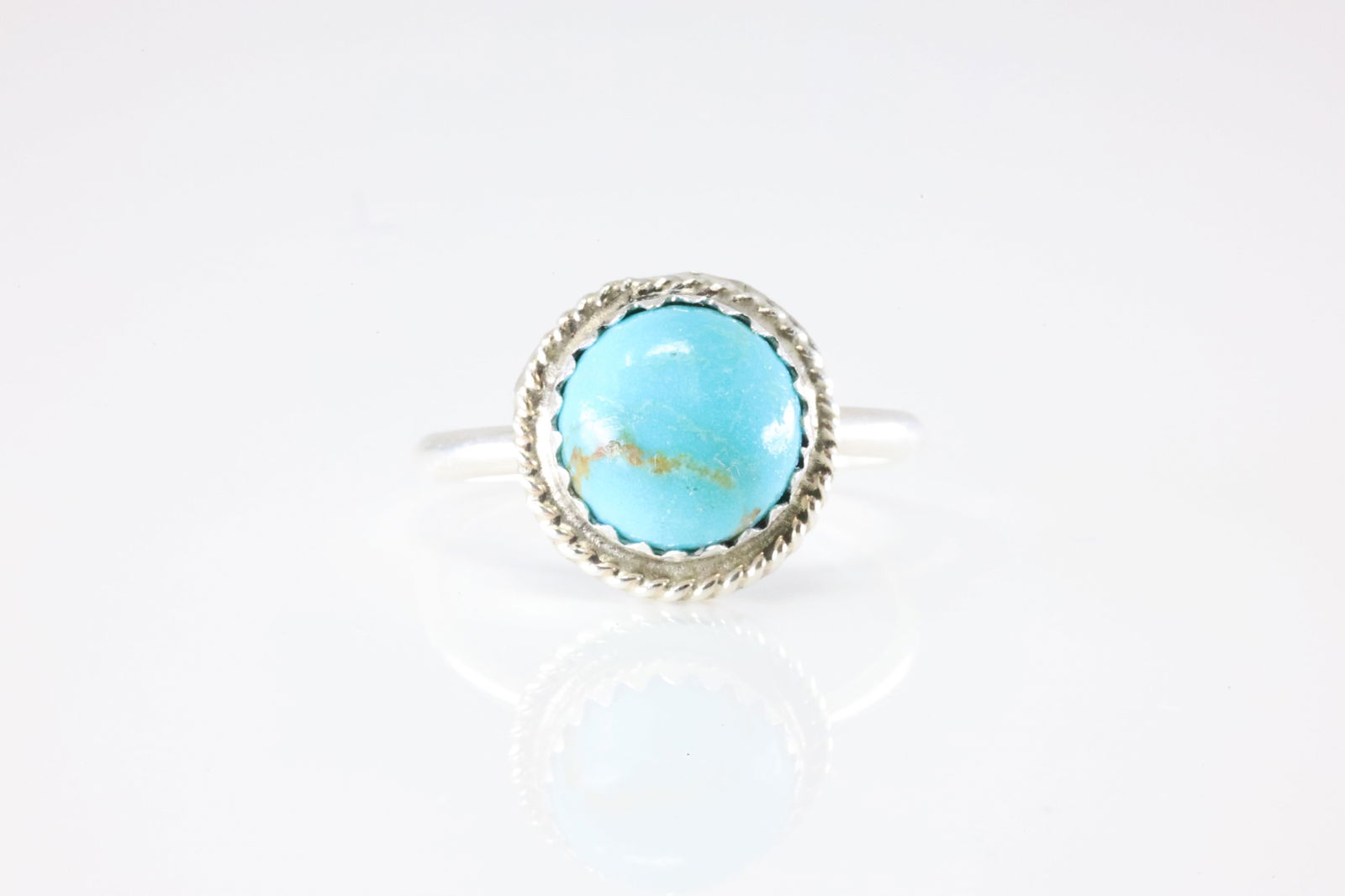 Native America Navajo Sterling Silver Turquoise Ring By EW.: This is a Native America Navajo Sterling Silver Turquoise Ring By EW. Stamp EW. Ring Size: 6.50.