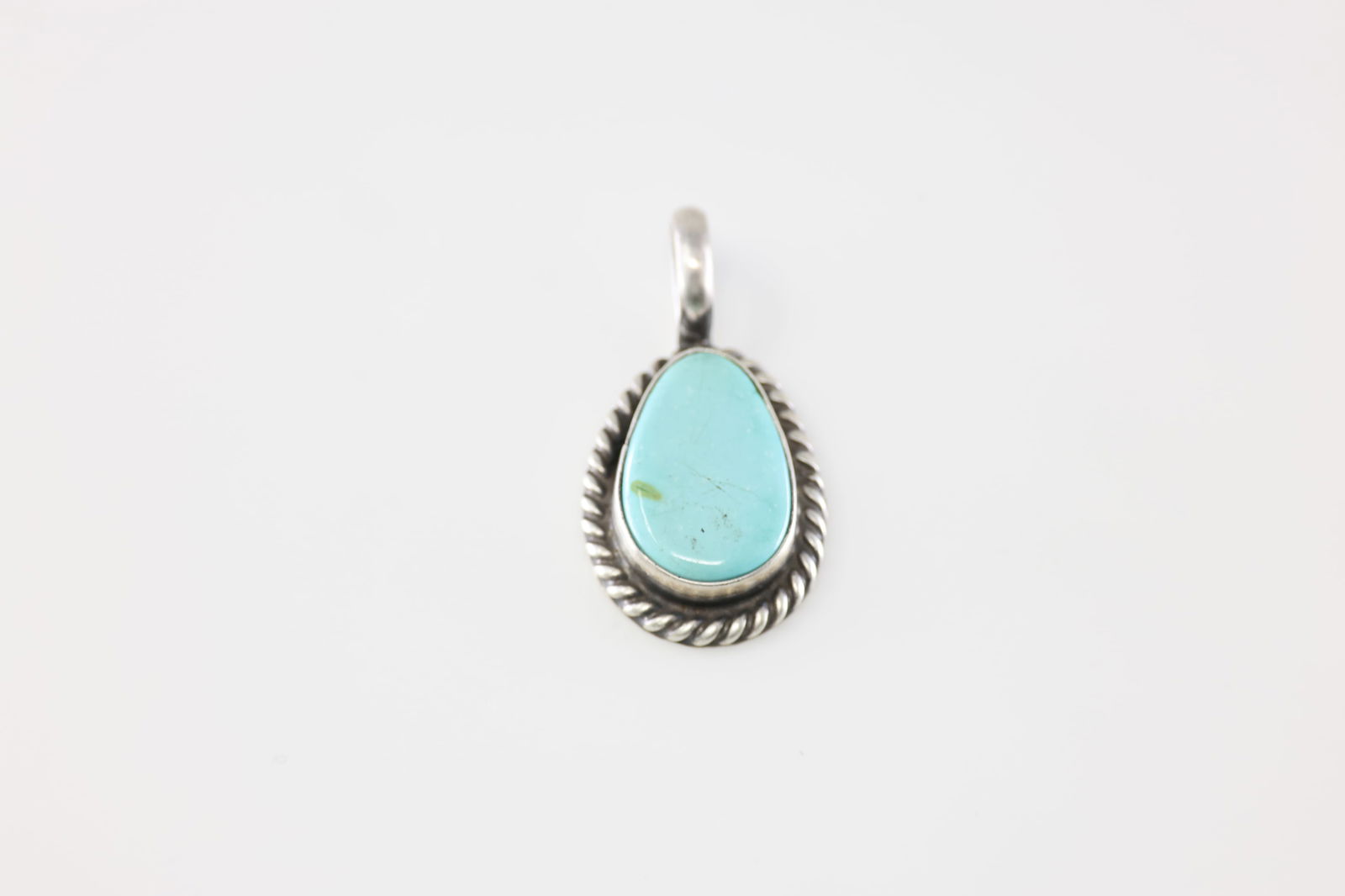 Native American Navajo Sterling Silver Turquoise Pendant By Johnny Dixon.: This is a Native American Navajo Sterling Silver Turquoise Pendant By Johnny Dixon. Stamp Dixon.
