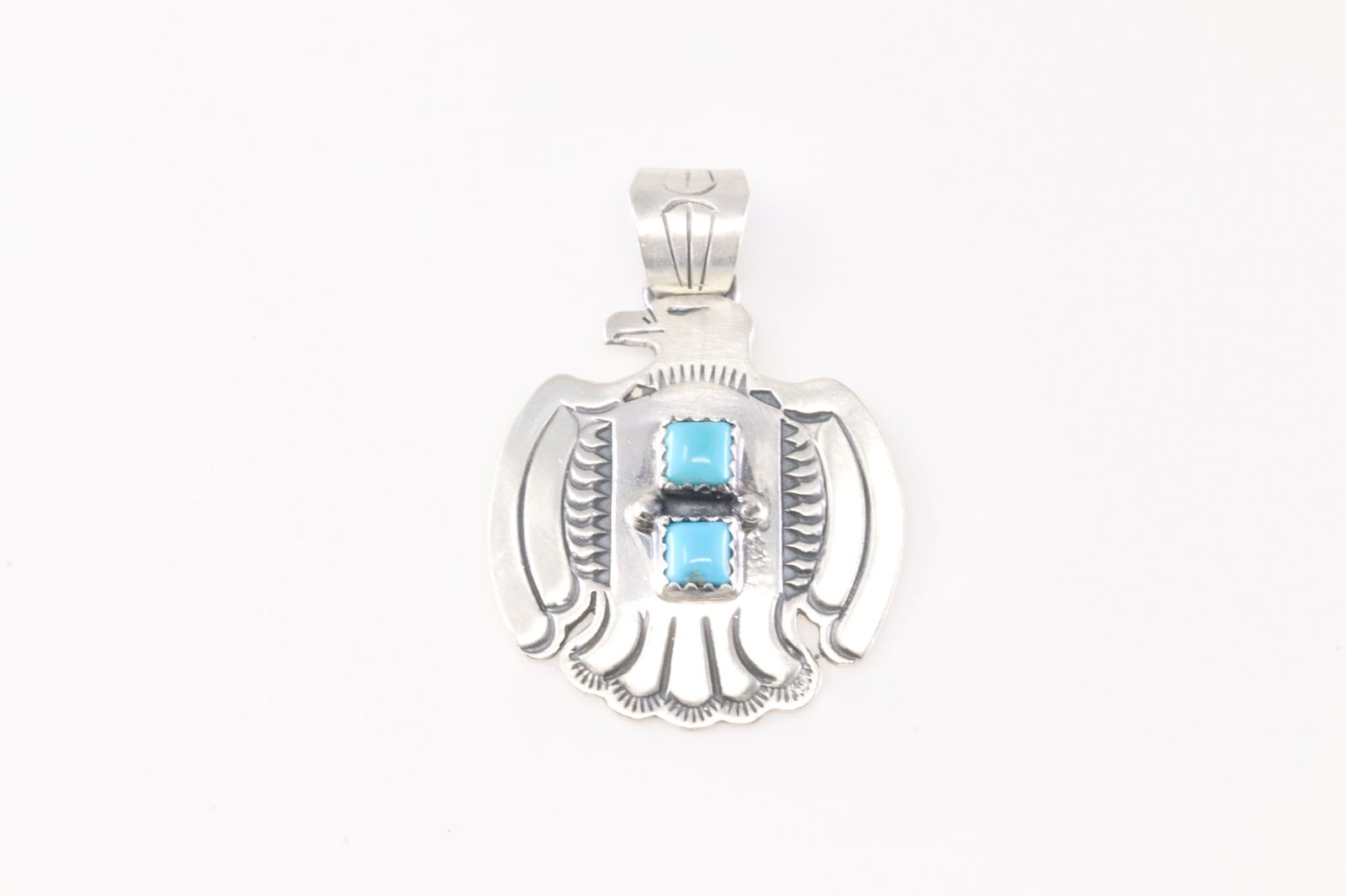 Native America Navajo Sterling Silver Turquoise Thunderbird Pendant By Robinson Martinez.: This is a Native America Navajo Sterling Silver Turquoise Thunderbird Pendant By Robinson Martinez. Stamp Fron R.B Company.