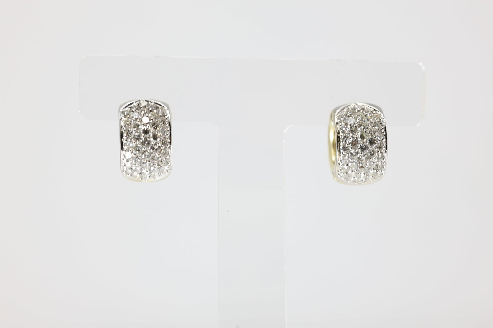 Diamond Hoop Earring 18Kt.: Ladies 18Kt Yellow Gold Diamond Hoop Earring. This Elegant Earring's has 80 Round Sparkling Diamonds. Diamond Weight Approx:1.50 ctw Total Weight: 12.54 Grams.