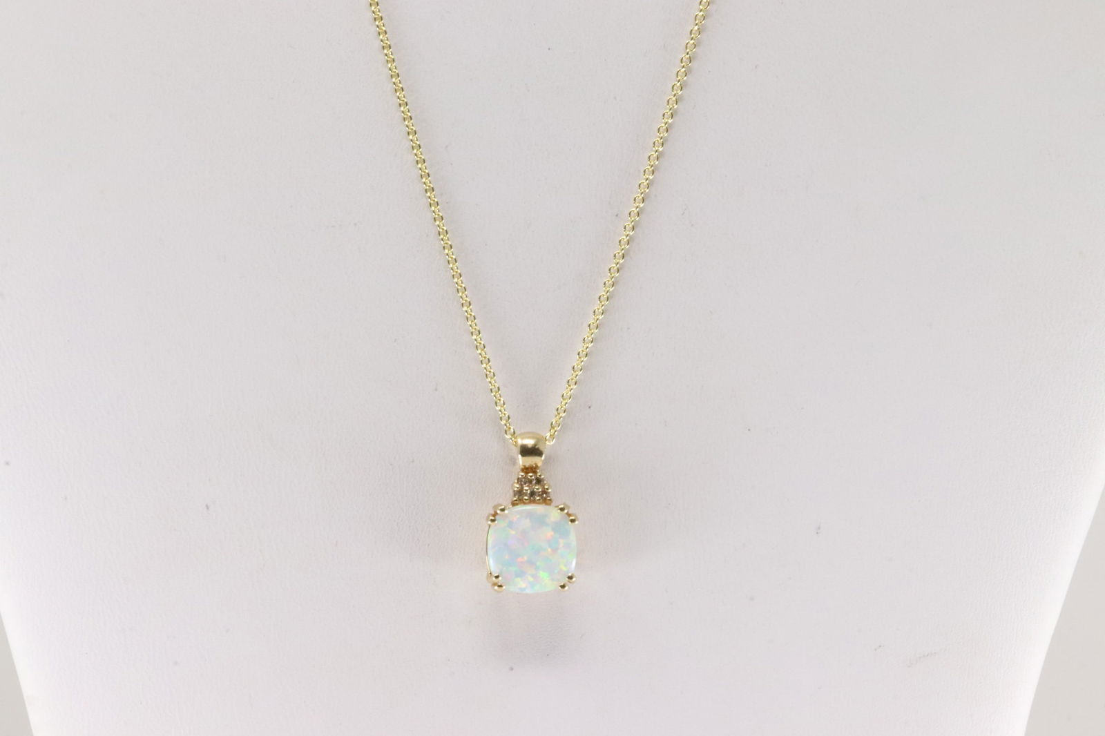 Opal & Diamond Pendant / Necklace 14Kt.: 14Kt Yellow Gold Opal & Diamond Pendant / Necklace. This necklace has one Pendant with one cut Opal and 5 round diamonds. Necklace length: 18.00" Total weight: 4.10 Grams.