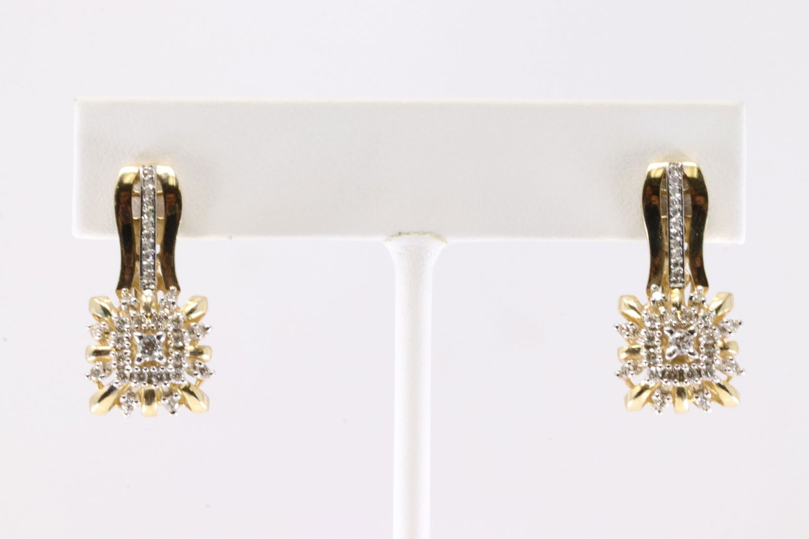 Diamond French Hoop Earring 14Kt.: Ladies 14Kt Yellow Gold Diamond French Hoop Earring. This Elegant French Hoop Earring's has Brilliants Diamonds. Diamonds weight approx: 0.50 ctw Total weight: 7.82 Grams.