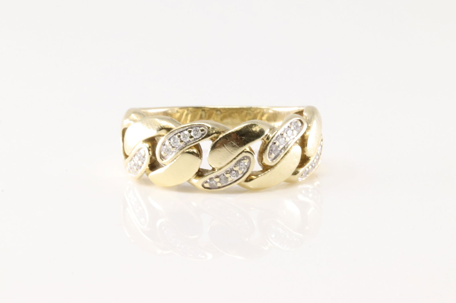 Men's Cuban Diamond Ring 10Kt.: Men's Cuban design 10Kt Yellow Gold Diamond Ring. This Gorgeous Ring has 20 Round Diamonds. Diamond Weight Approx: 0.50ctw. Ring Size: 10.00. Total Weight: 8.73