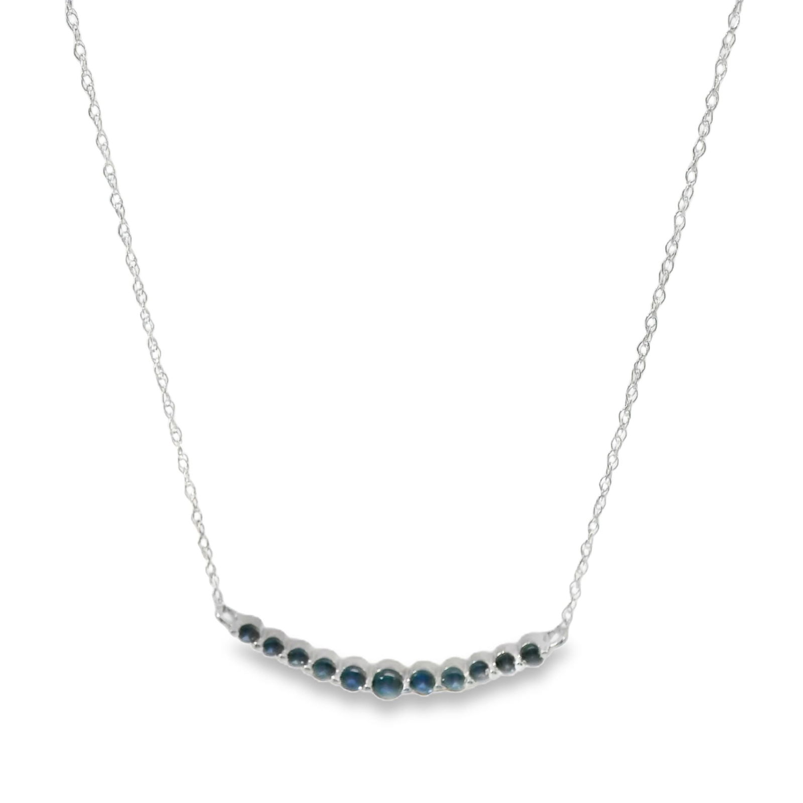 Sapphire Pendant / Necklace 14Kt.: Ladies 14Kt White Gold Sapphire Pendant / Necklace. Necklace features a delicate Chain adorned with a row of shimmering Sapphire's Gems. The minimalist design makes it perfect for both casual and