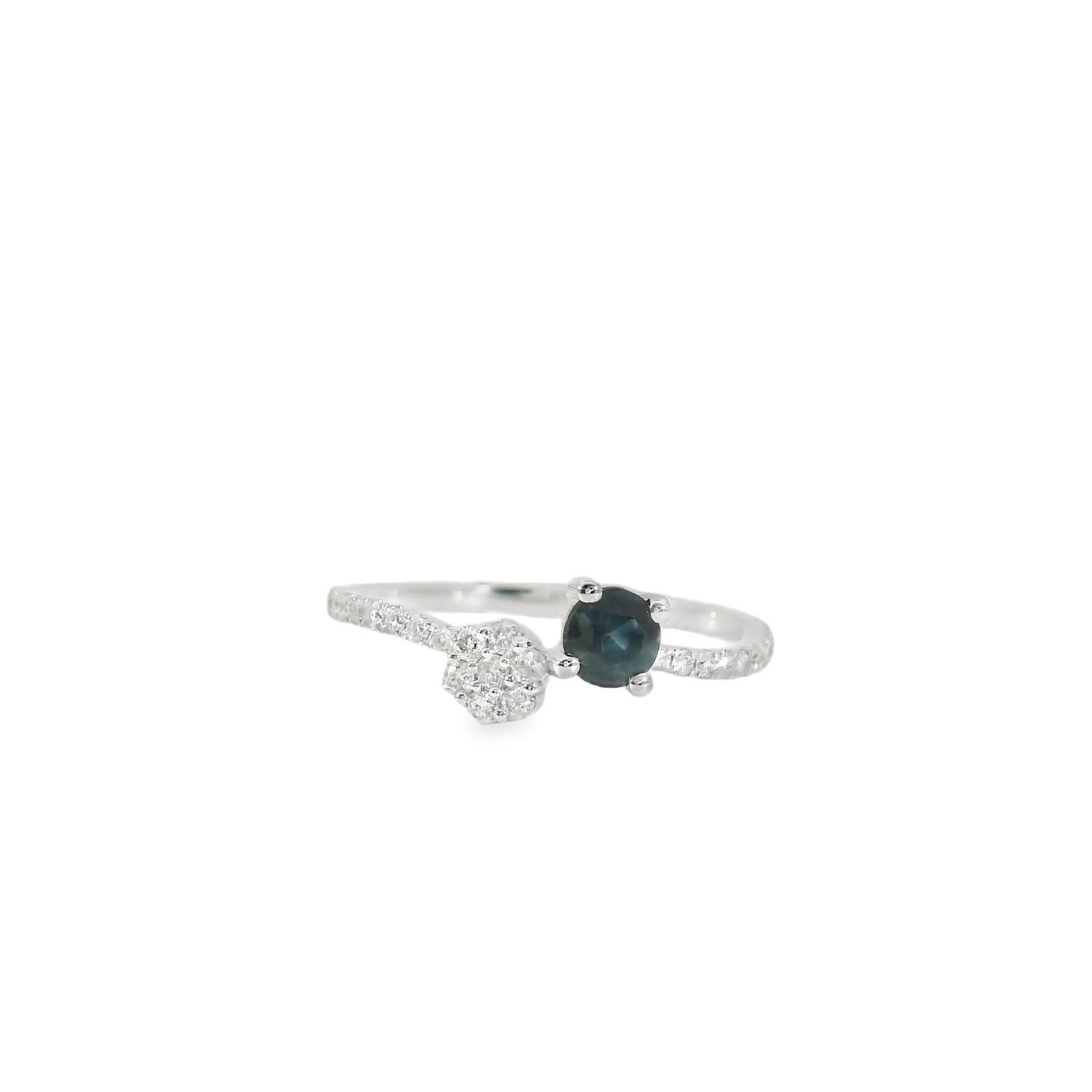 Sapphire & Diamond Ring 14Kt.: Ladies 14Kt White Gold Sapphire & Diamond Ring. This elegant diamond ring features a Sapphire set in a sleek band. The intricate design is accentuated by 27 sparkling diamonds, making it the perfect a