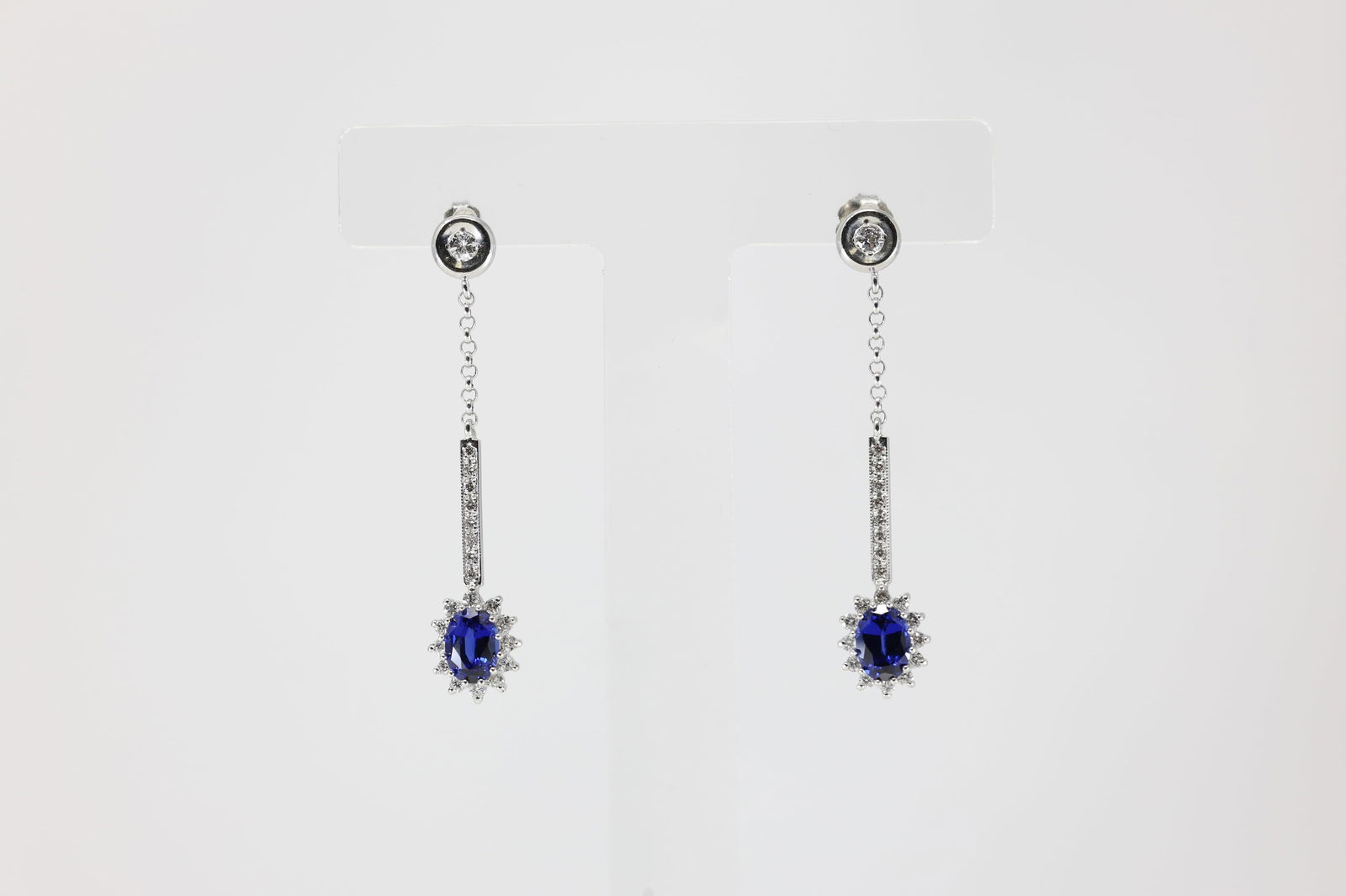 Sapphire & Diamond Stud Earring 14Kt.: Ladies 14Kt White Gold Sapphire & Diamond Stud Earring. This Earring's have Gorgeous Sapphire Gemstone With 42 Round Sparkling Diamonds. Diamond Weight Approx: 0.45 ctw Total Weight: 4.15 Grams.