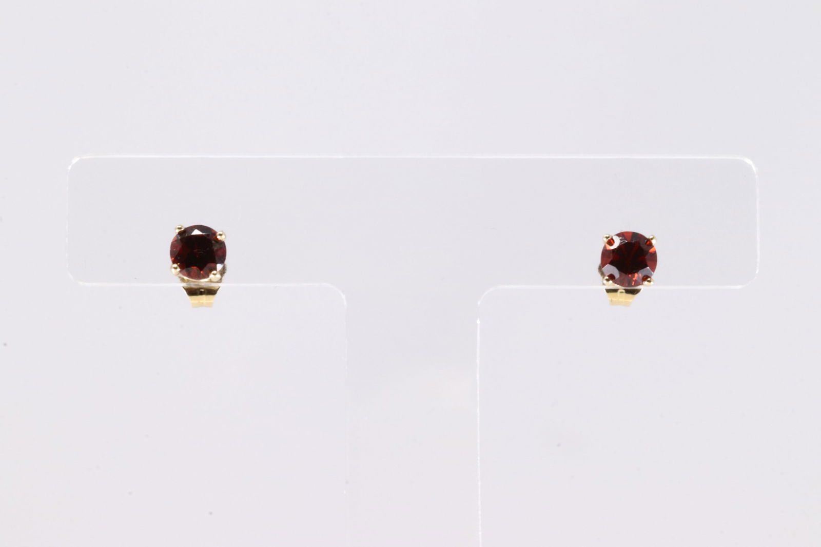 Ruby Stud Earring 14Kt.: Ladies 14Kt Yellow Gold Ruby Stud Earring. This Gorgeous Earring's has 2 Round Ruby Gemstones.
