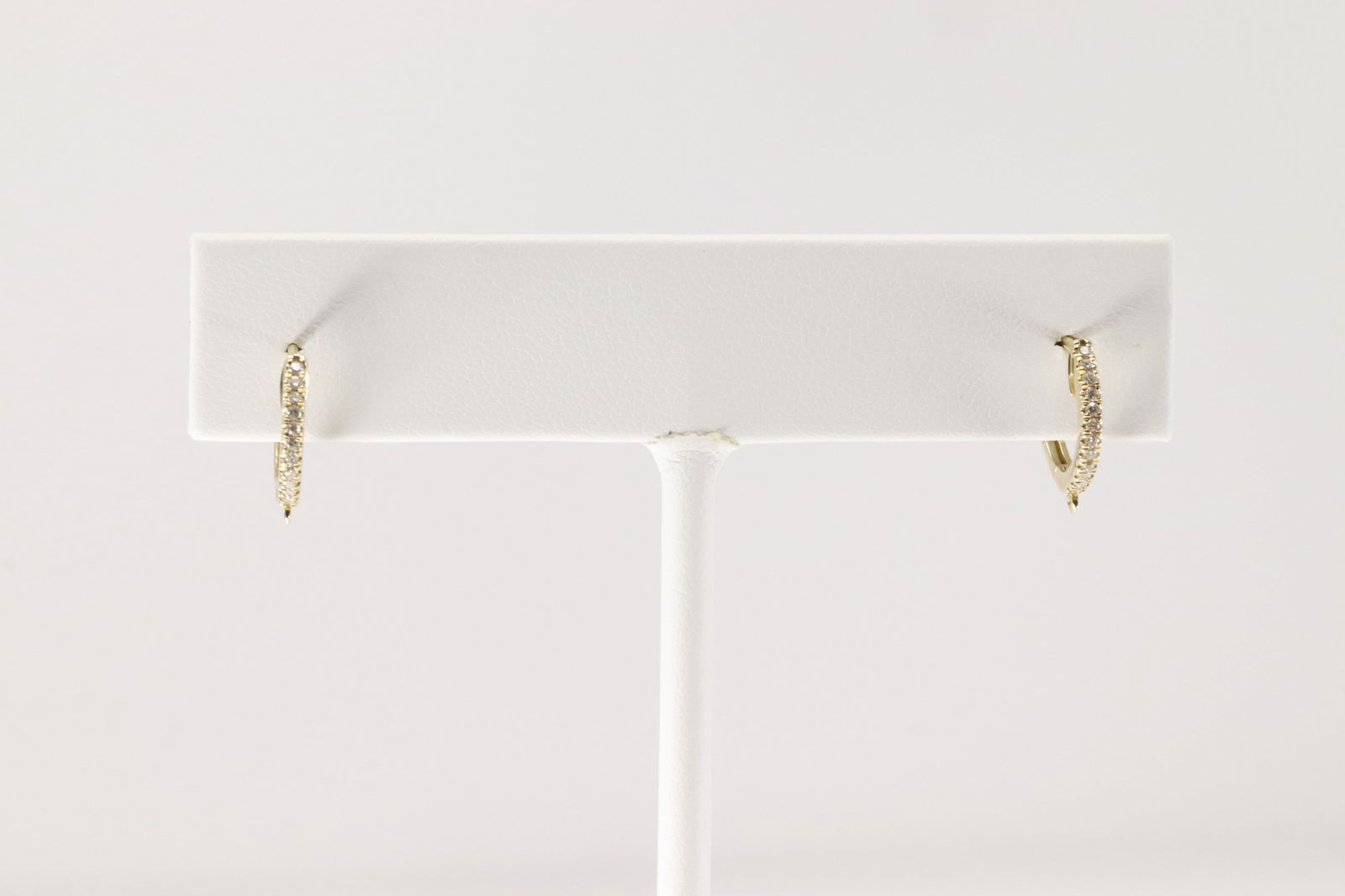 Diamond Hoop Earring 14kt.: Ladies 14kt Yellow Gold Diamond Hoop Earring. Beautiful Earring's With 24 Round Sparkling Diamonds. Diamond Weight: 0.10ct.