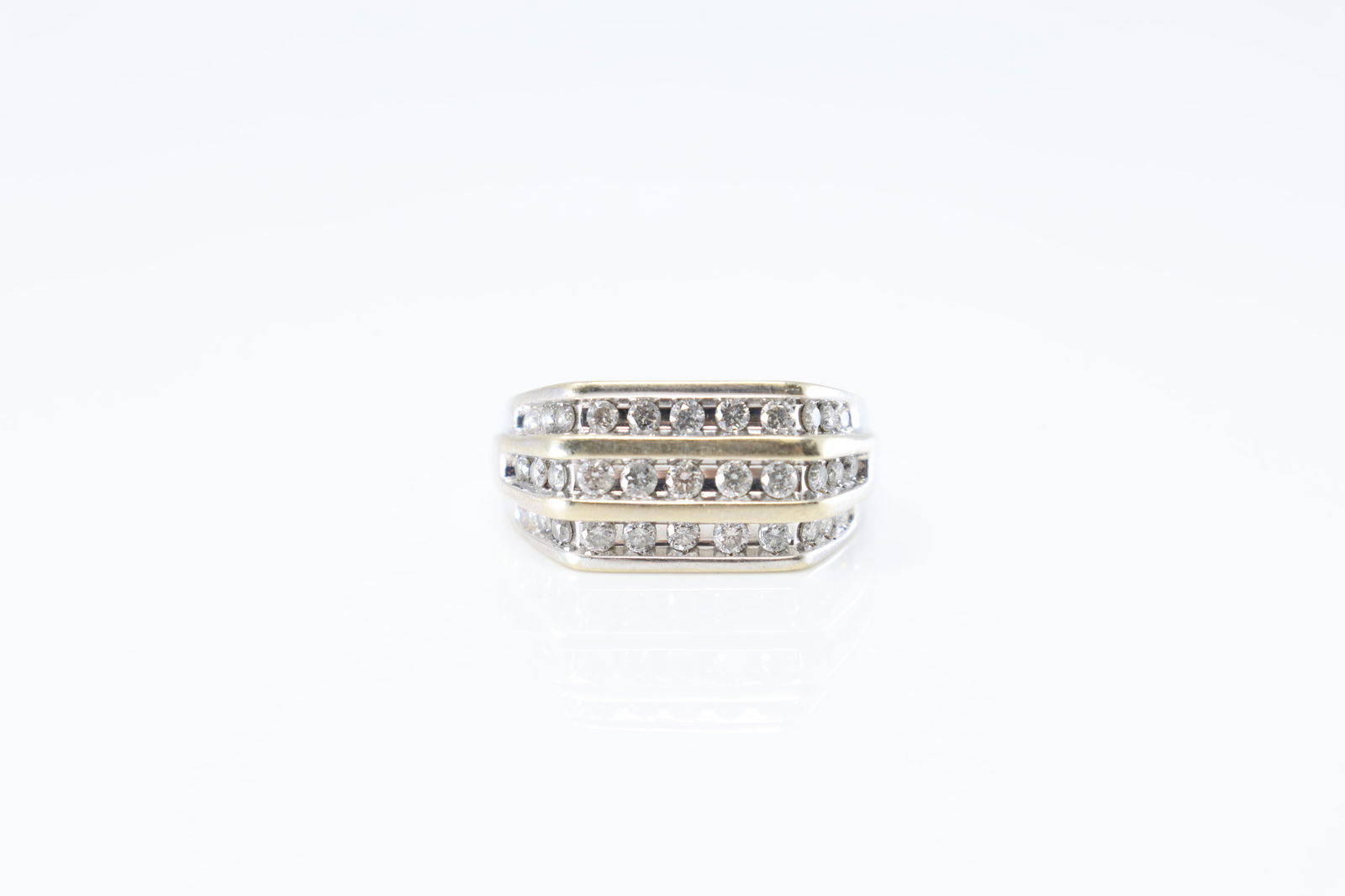 Diamond Ring 14Kt.: 14Kt White Gold Diamond Ring. Ring has an design of 3 row with 33 round brilliants diamonds. Diamonds weight approx: 1.25ctw. Ring size: 10.00. Total weight: 5.70 Grams.