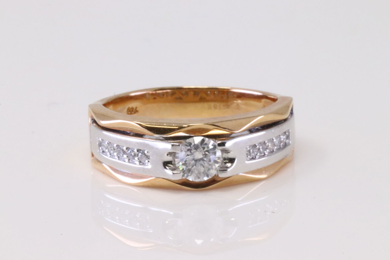 18KT Y/G Diamond Ring: Ladies 14Kt White Gold Diamond Engagement Ring. Ring has round Brilliant Diamonds. Diamonds weight approx: Ring size: 7.00. Total weight: 2.90 Grams.