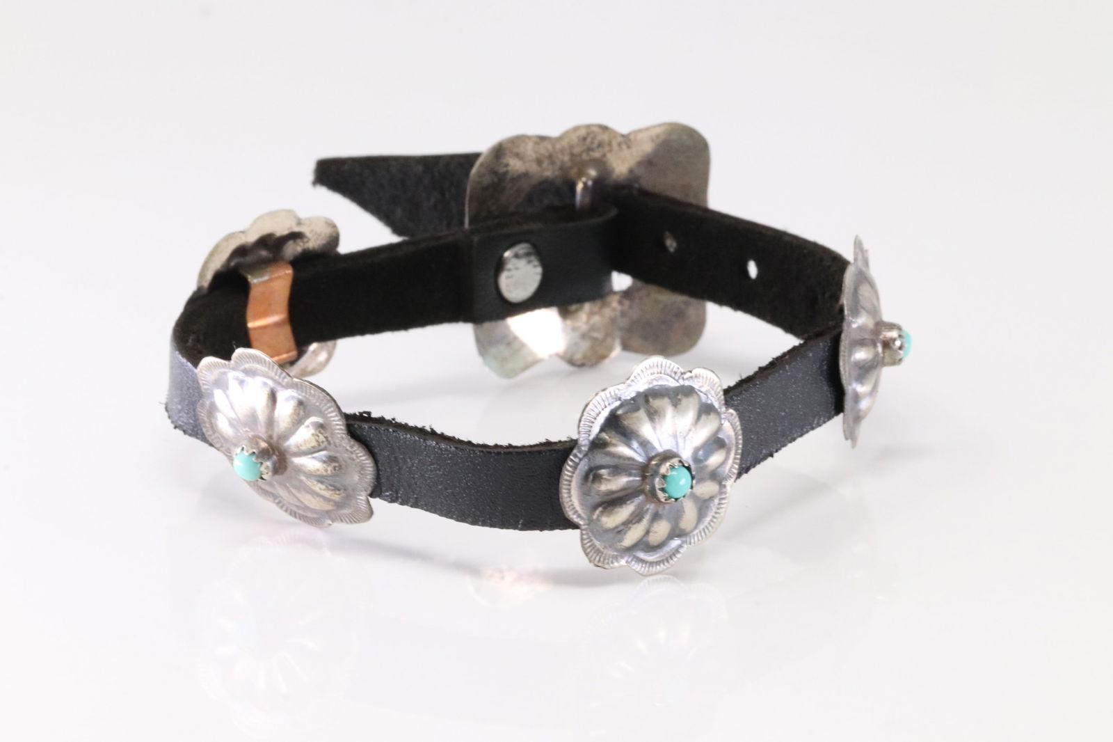 Native America Navajo Sterling Silver Turquoise Leather Buckle Bracelet By Joan Begay.: This is a Native America Navajo Sterling Silver Turquoise Leather Buckle Bracelet By Joan Begay. Stamp B. Bracelet Length: 18.00.