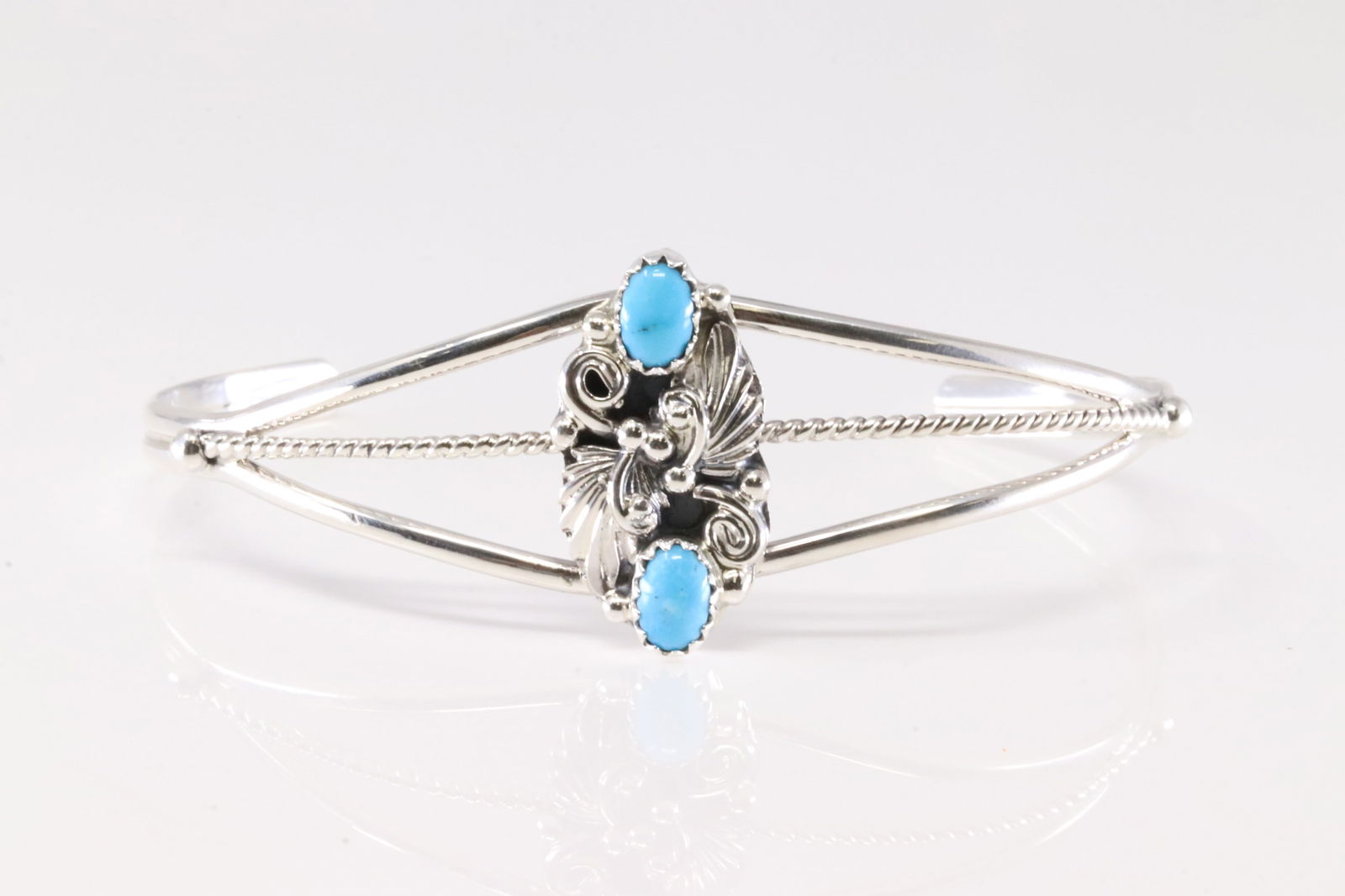 America Sterling Silver Turquoise Bracelet Floral Cuff.: This is a America Sterling Silver Turquoise Bracelet Floral Cuff.