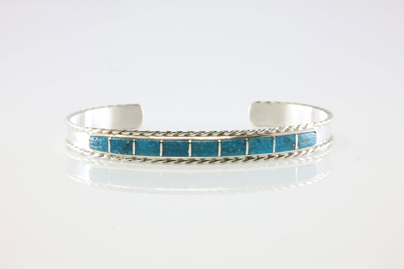 Native America Navajo Sterling Silver Turquoise Inlay Bracelet Cuff By JP.: This is a Native America Navajo Sterling Silver Turquoise Inlay Bracelet Cuff By JP. Stamp JP.