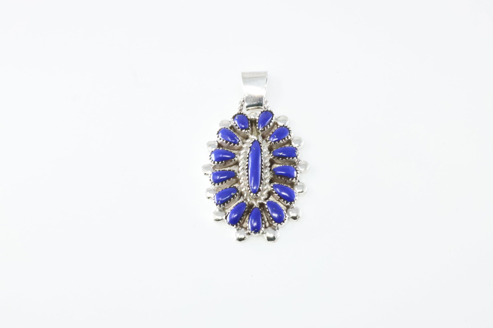 Native America Zuni Sterling Silver Blue Lapiz Pendant By Lorraine Waatsa.: This is a Native America Zuni Sterling Silver Blue Lapiz Pendant By Lorraine Waatsa.