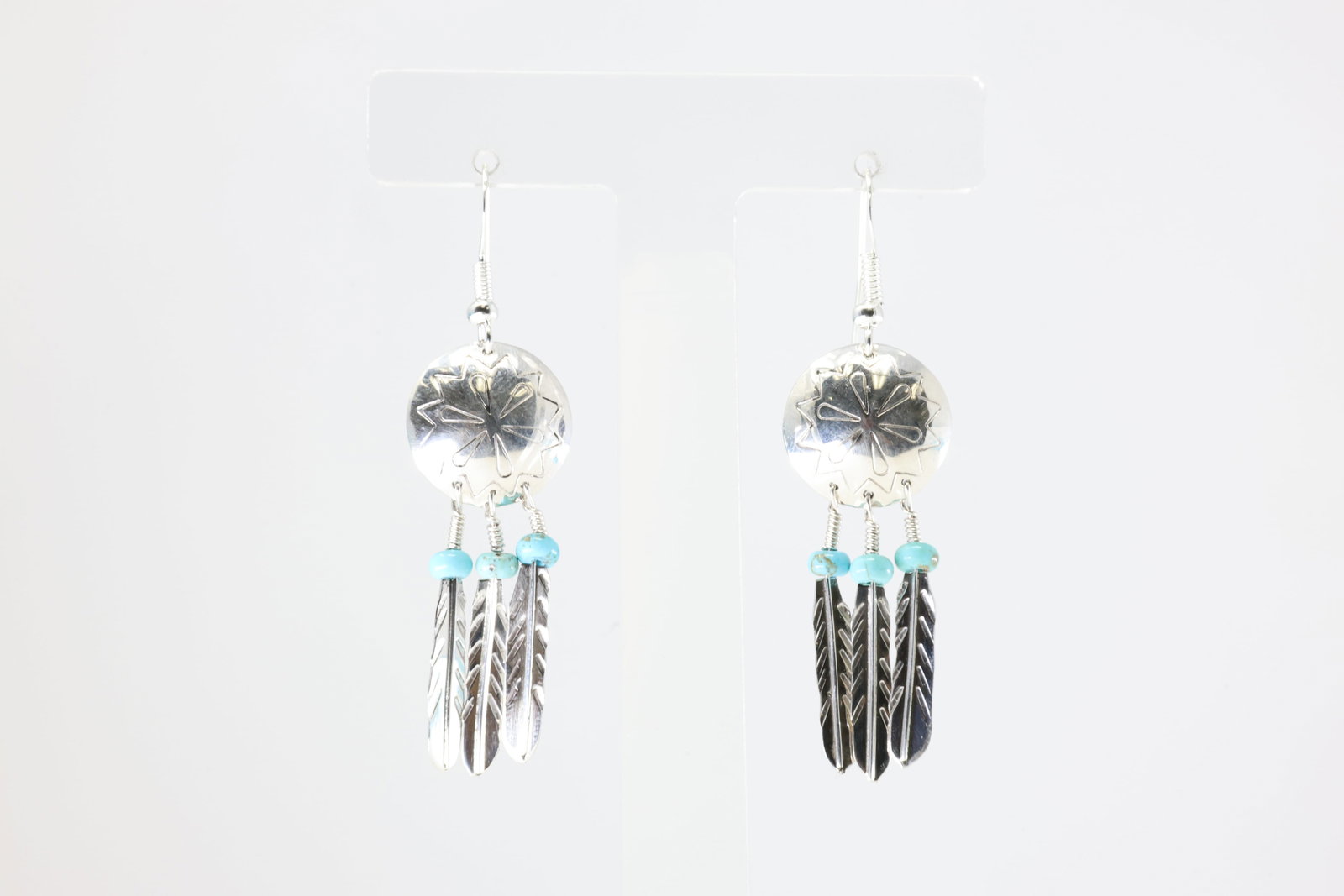 America Sterling Silver Turquoise Feather Dangling Earring's.: This is a America Sterling Silver Turquoise Feather Dangling Earring's.