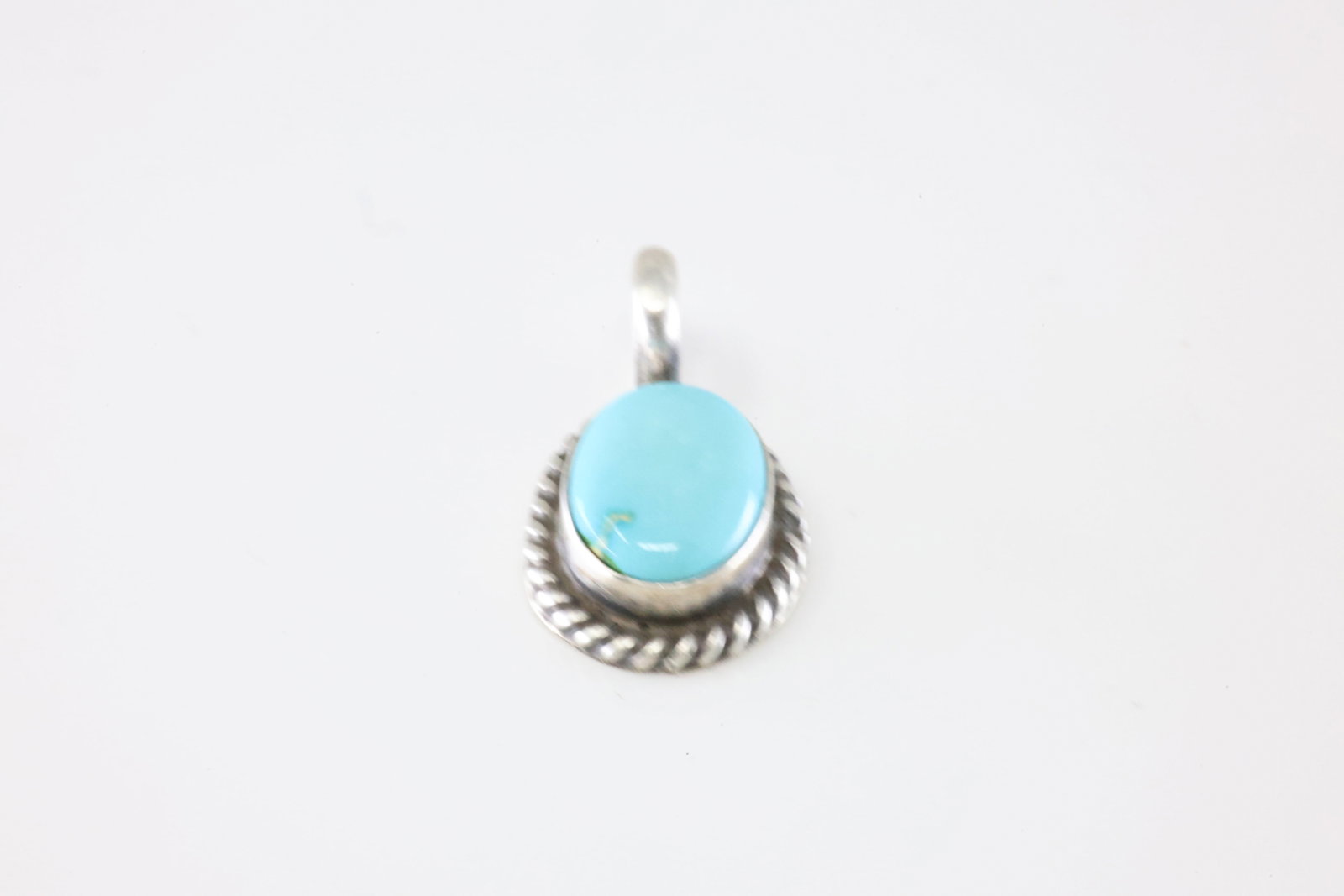 Native America Navajo Sterling Silver Turquoise Pendant By Johnny Dixon.: This is a Native America Navajo Sterling Silver Turquoise Pendant By Johnny Dixon. Stamp Dixon.