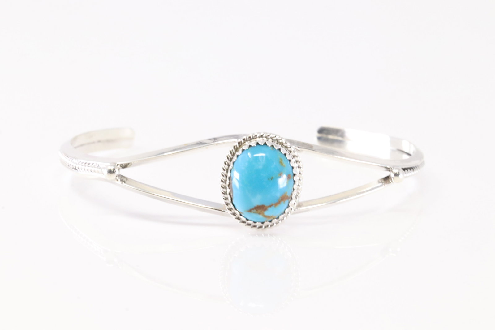 Native America Navajo Sterling Silver Turquoise Bracelet Cuff By Sadie Jim.: This is a Native America Navajo Sterling Silver Turquoise Bracelet Cuff By Sadie Jim. From R.B Company.