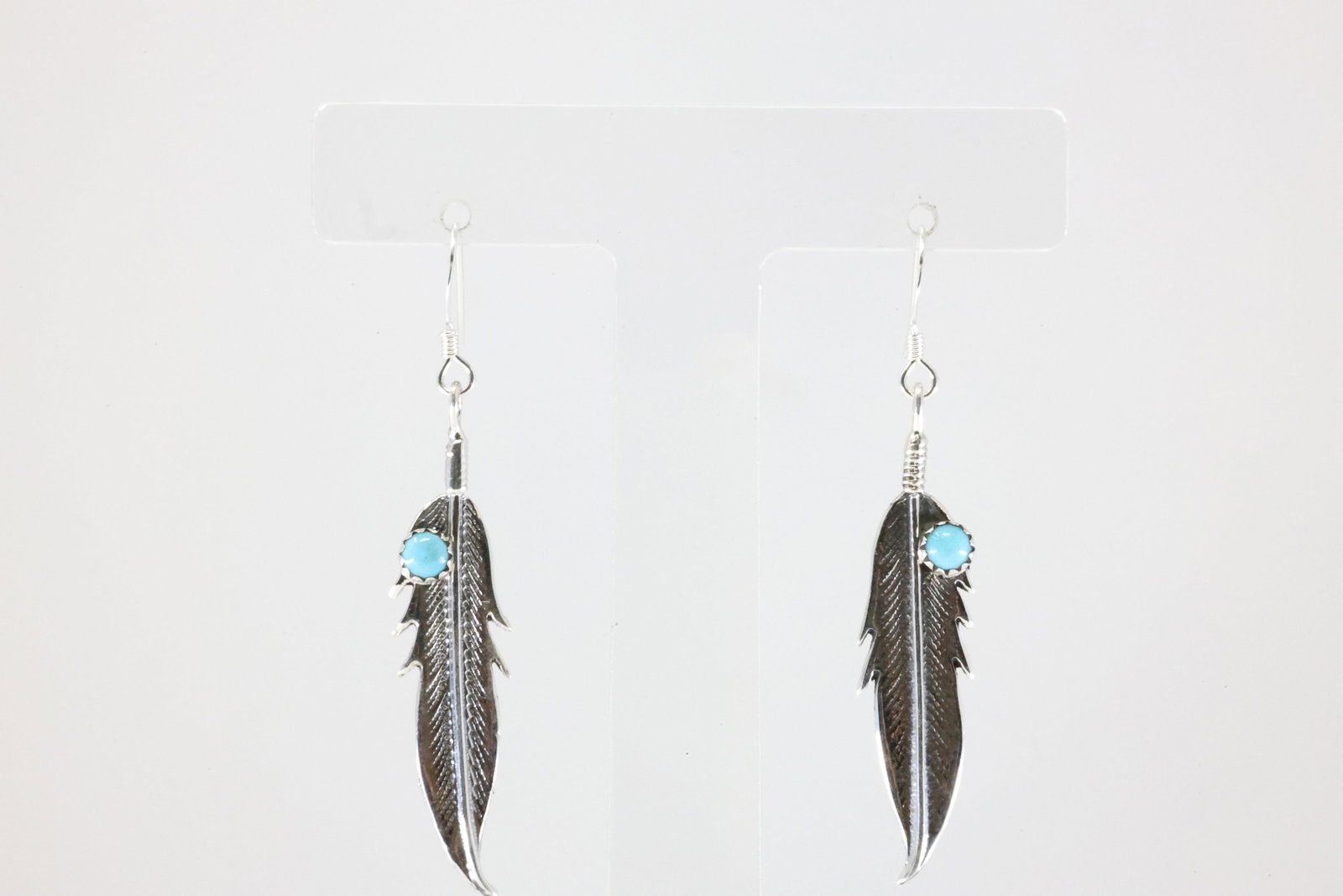 America Sterling Silver Turquoise Feather Dangling Earring's.: This is a America Sterling Silver Turquoise Feather Dangling Earring's.