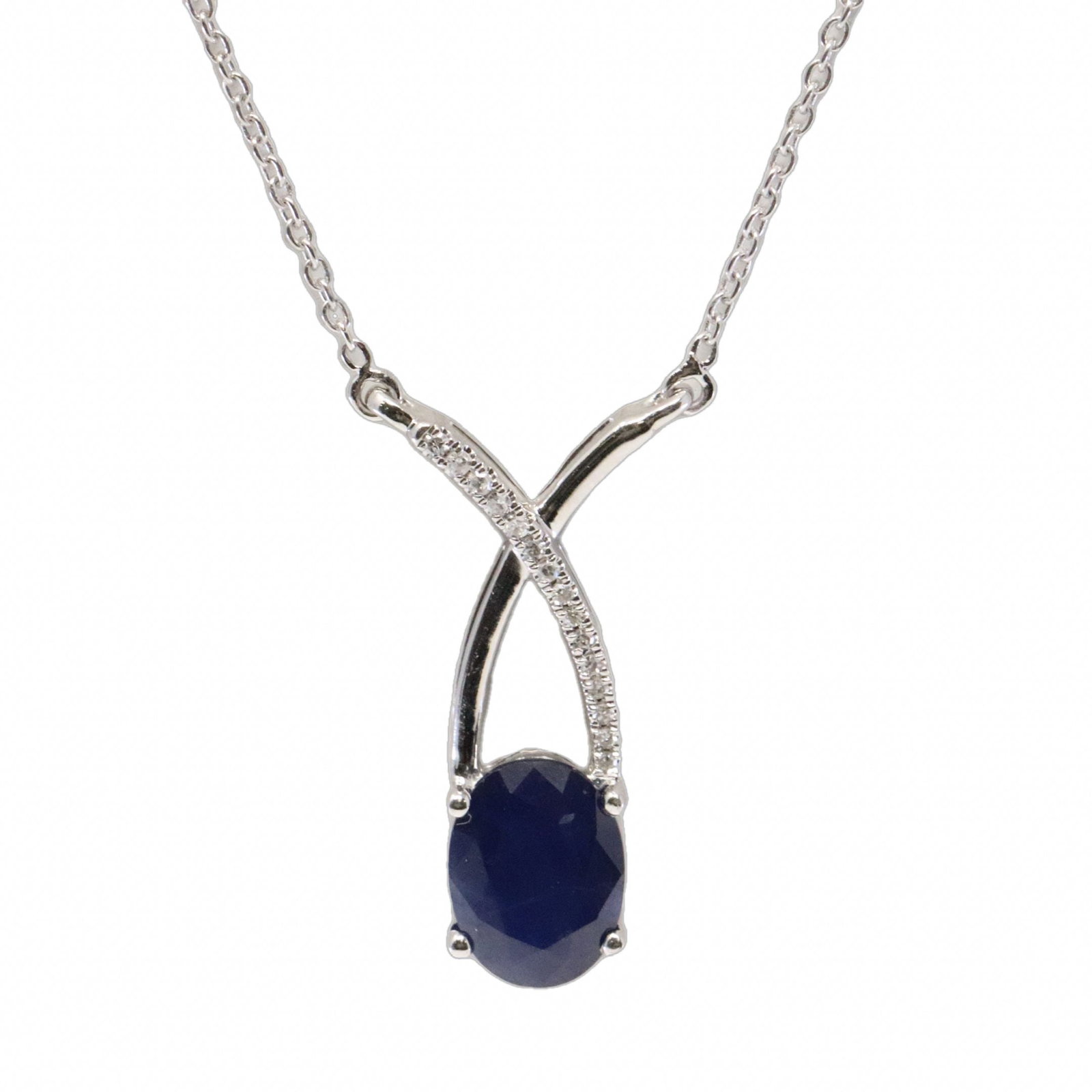 Sapphire & Diamond Pendant / Necklace 10Kt.: Ladies 10Kt White Gold Sapphire & Diamond Pendant / Necklace. Necklace has one Oval Saphhire with 15 Diamonds. Necklace length: 18.00" Adjustable" Total weight: 2.30 Grams.