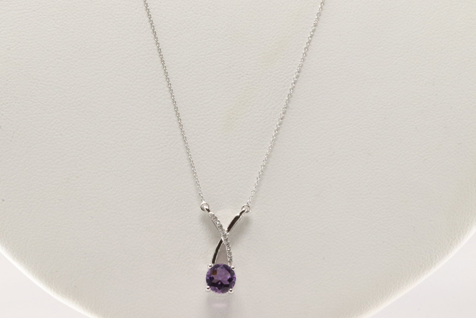 Amethyst & Diamond Pendant / Necklace 10Kt.: Ladies 10Kt White Gold Amethyst & Diamodn Pendant / Necklace. Necklace has Pendant with round Amethyst with Sparkling Diamonds. Necklace length: 18.00"