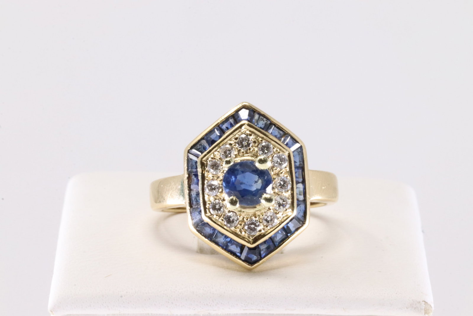 Sapphire & Diamond Ring 18Kt.: 18Kt Yellow Gold Sapphire & Diamond Ring. This Elegant Ring has Baguette & Round Sapphires with Saprkling Diamonds. Ring size: 6.50. Total weight: 5.27 Grams.