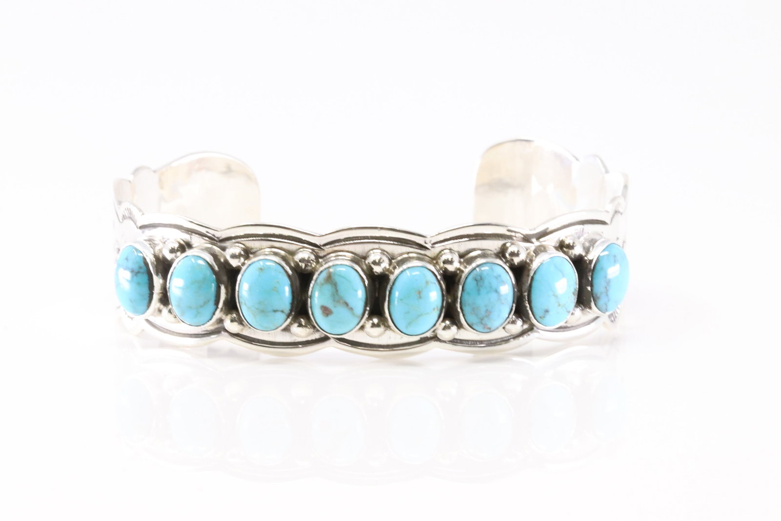 Native America Navajo Sterling Silver Turquoise 8 Stone Bracelet Cuff By Thomas Yazzie. From R.B: This is a Native America Navajo Sterling Silver Turquoise 8 Stone Bracelet Cuff By Thomas Yazzie. From R.B Company. Stamp By R.B Company.