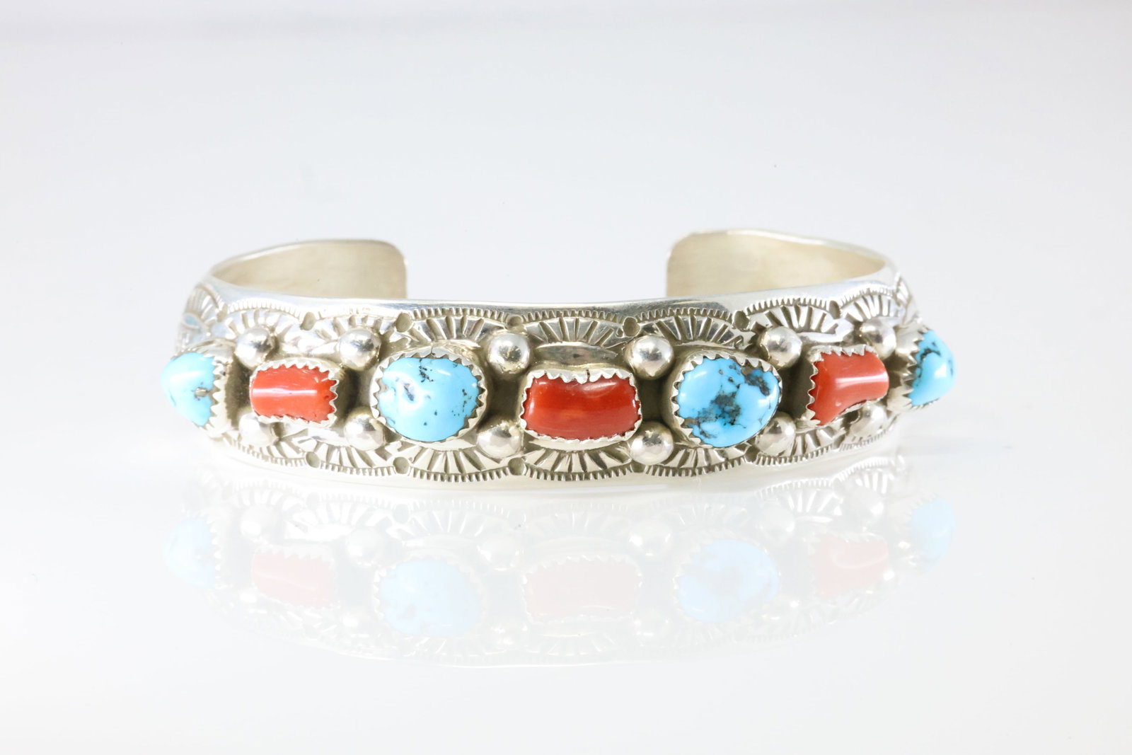 Native America Navajo Sterling Silver Coral & Turquoise Bracelet Cuff By GS.: This is a Native America Navajo Sterling Silver Coral & Turquoise Bracelet Cuff By GS. Stamp GS.