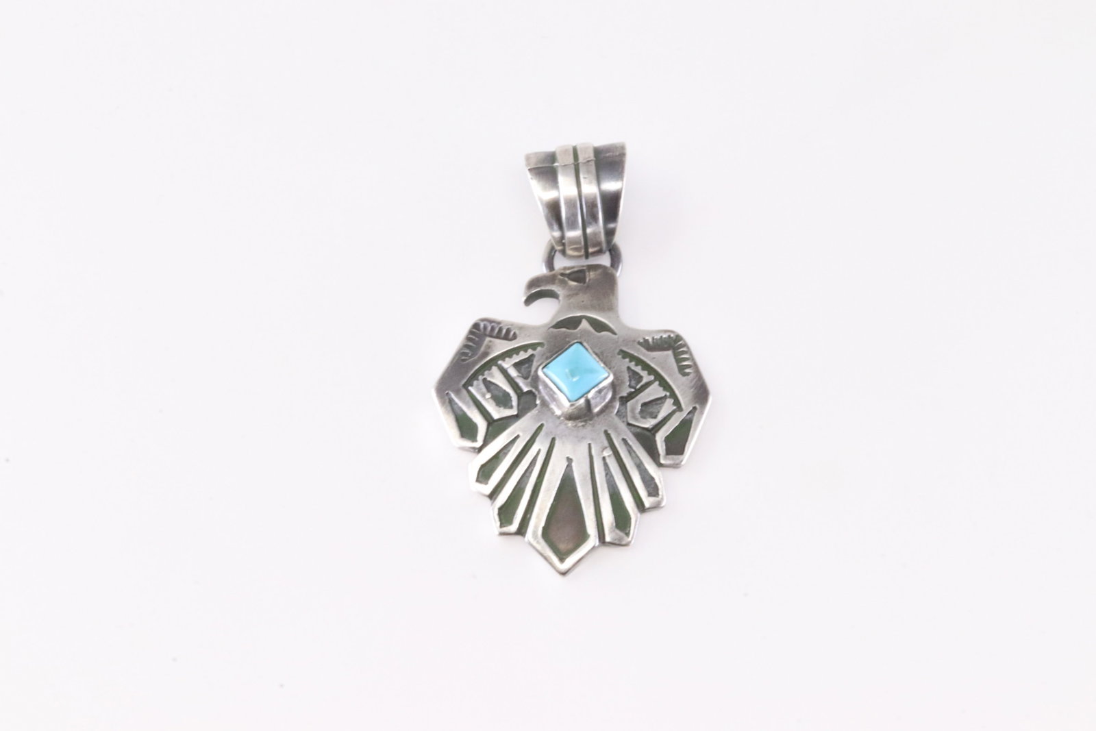 Native America Navajo Sterling Silver Turquoise Thunderbird Pendant By Jerold Joe.: This is a Native America Navajo Sterling Silver Turquoise Thunderbird Pendant By Jerold Joe.
