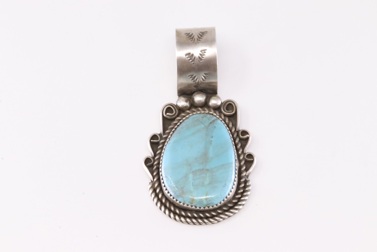 Native American Navajo Sterling Silver Turquoise Pendant By W.J.: This is a Native American Navajo Sterling Silver Turquoise Pendant By W.J.